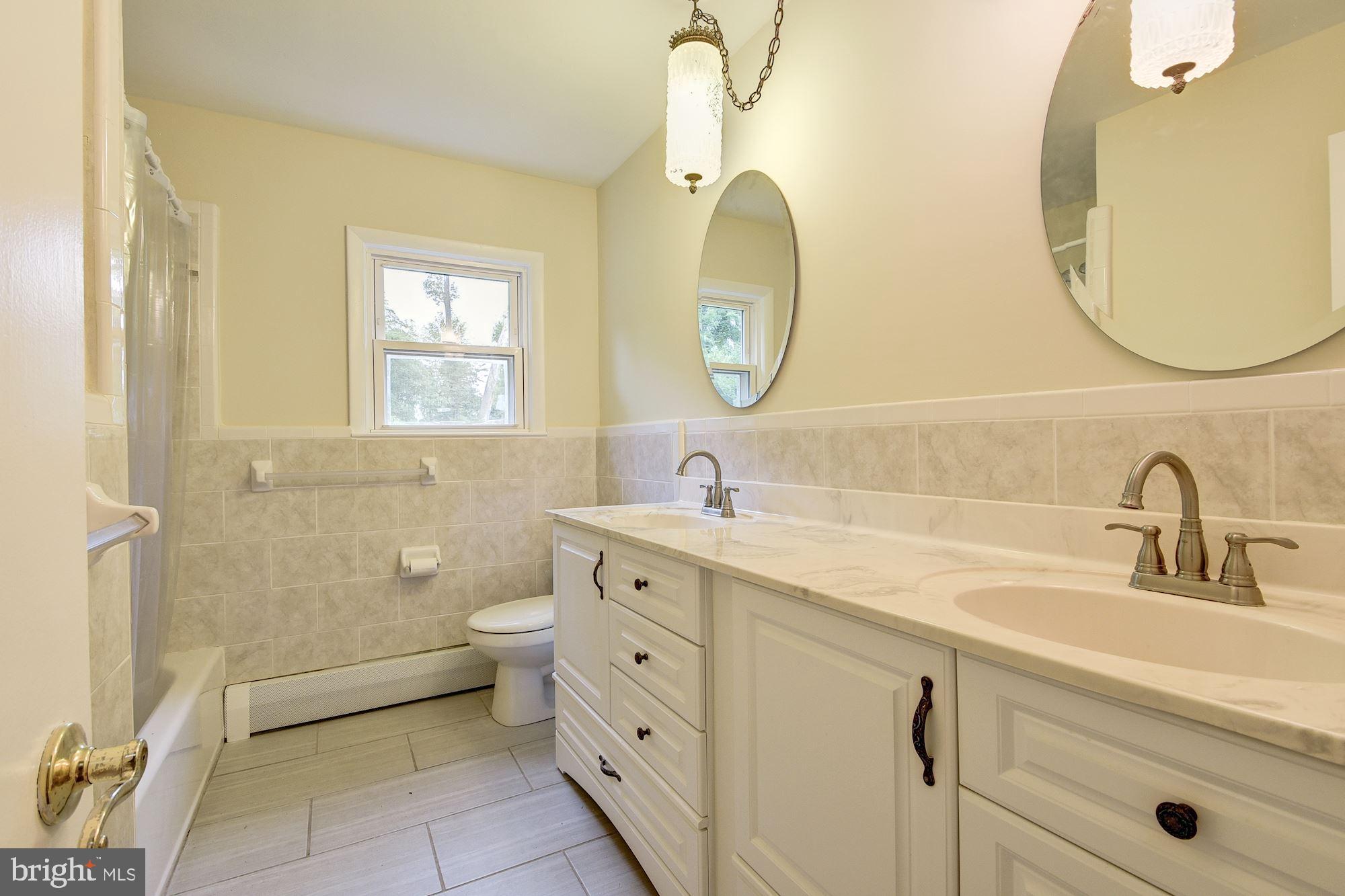 3304 Enterprise Road Bowie, MD 20721 - Photo 7 of 35 Hall Bath with Double Sinks