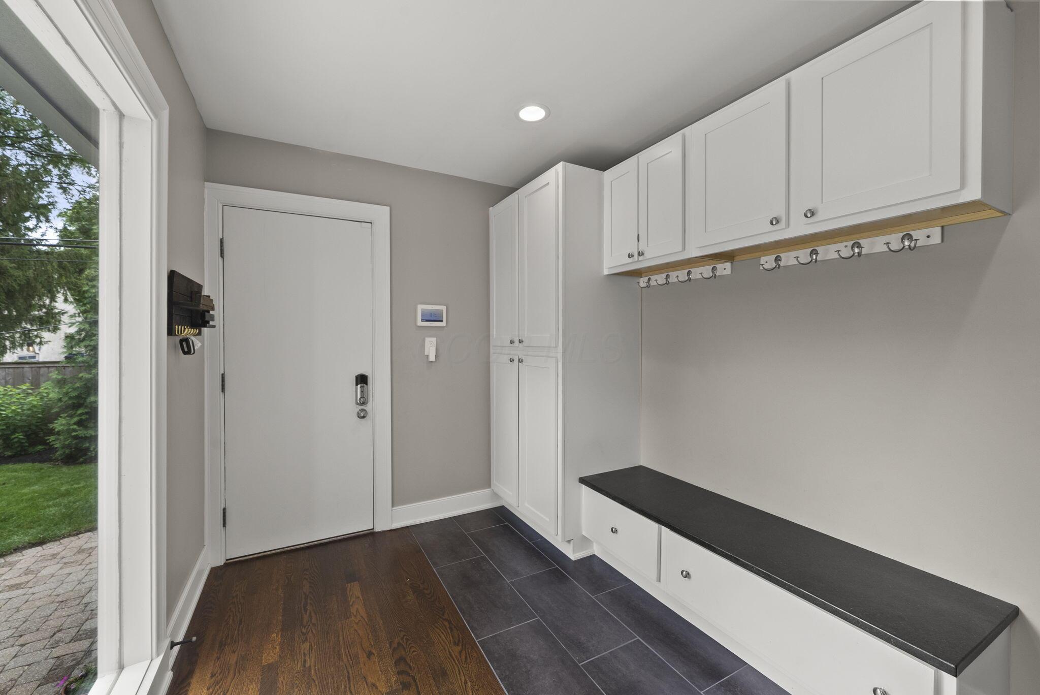 1851 Berkshire Road Columbus, OH 43221 - Photo 69 of 125 Drop zone, storage and bench, garage door.