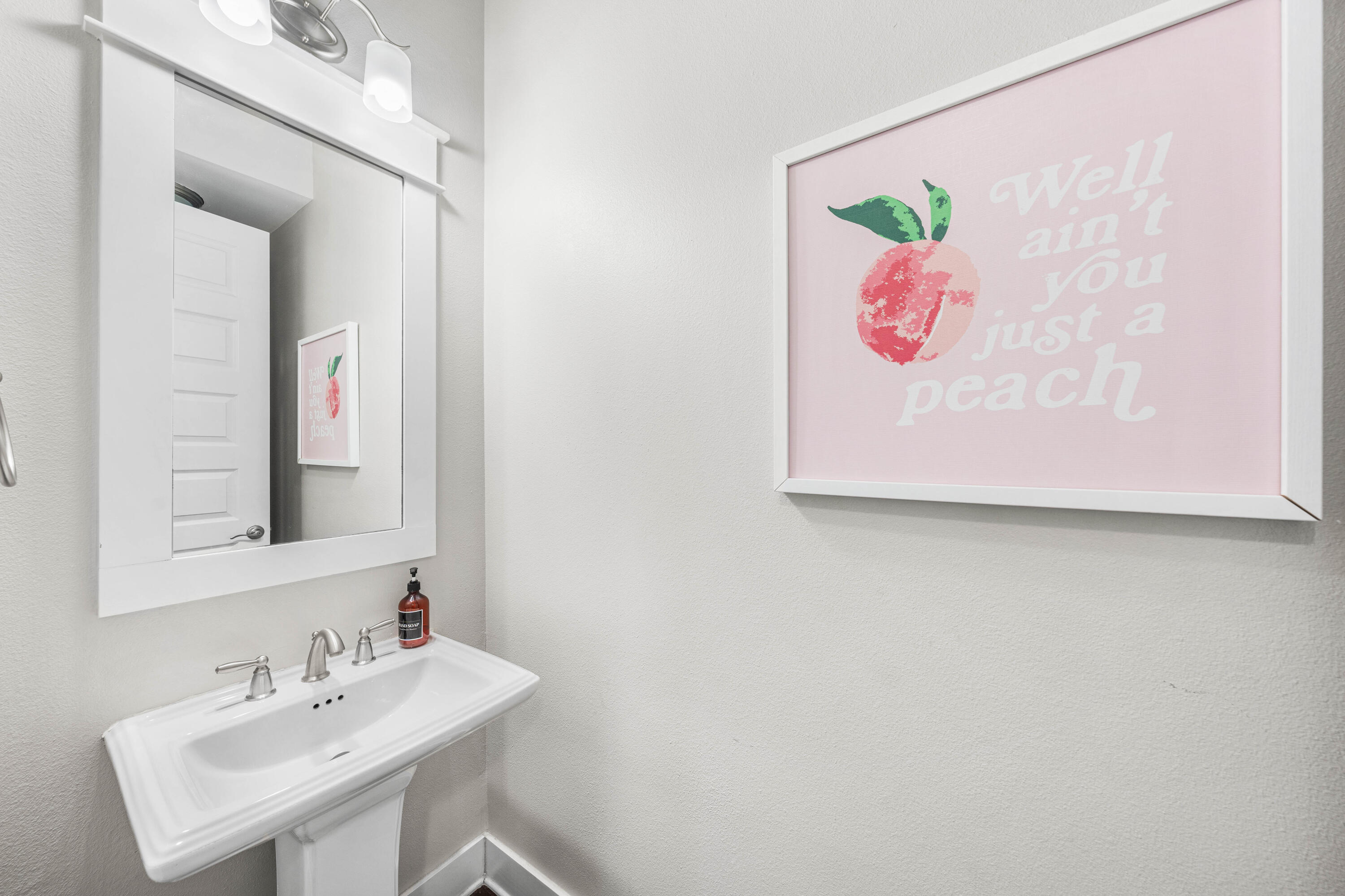91 Milestone Dr Inlet Beach, Unit B Inlet Beach, FL 32461 - Photo 14 of 51 a bathroom with a sink and a mirror