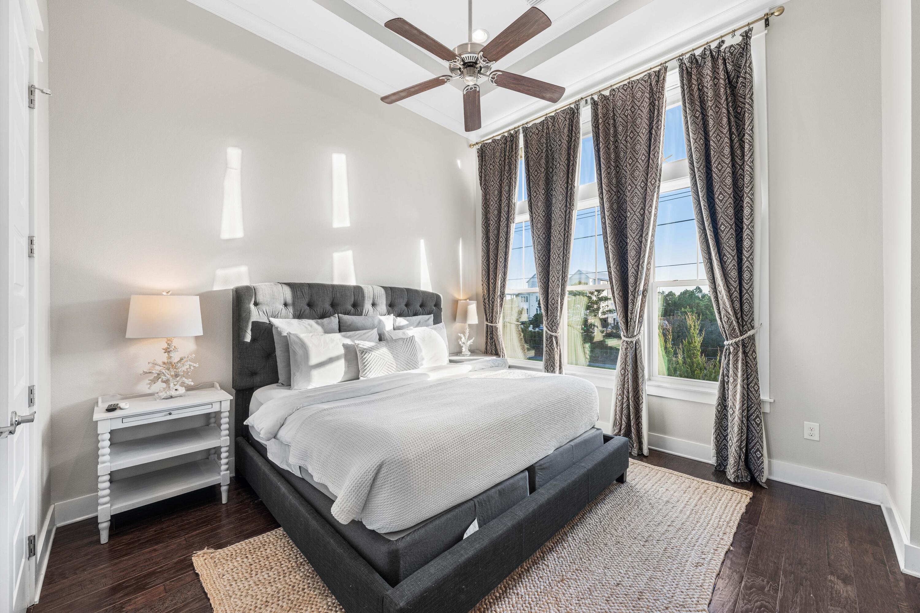 91 Milestone Dr Inlet Beach, Unit B Inlet Beach, FL 32461 - Photo 17 of 51 a bedroom with a large bed and a window