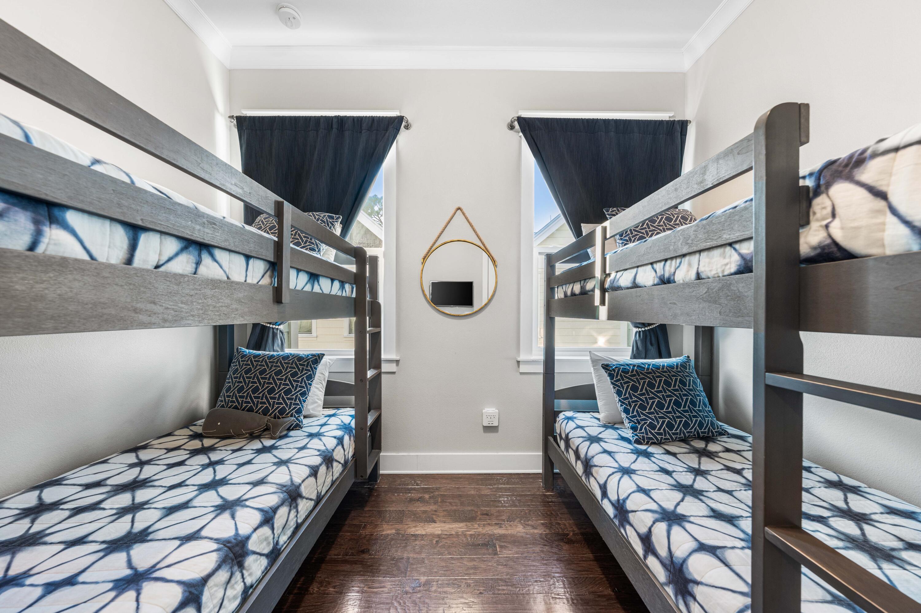 91 Milestone Dr Inlet Beach, Unit B Inlet Beach, FL 32461 - Photo 26 of 51 a bedroom with bed and a window