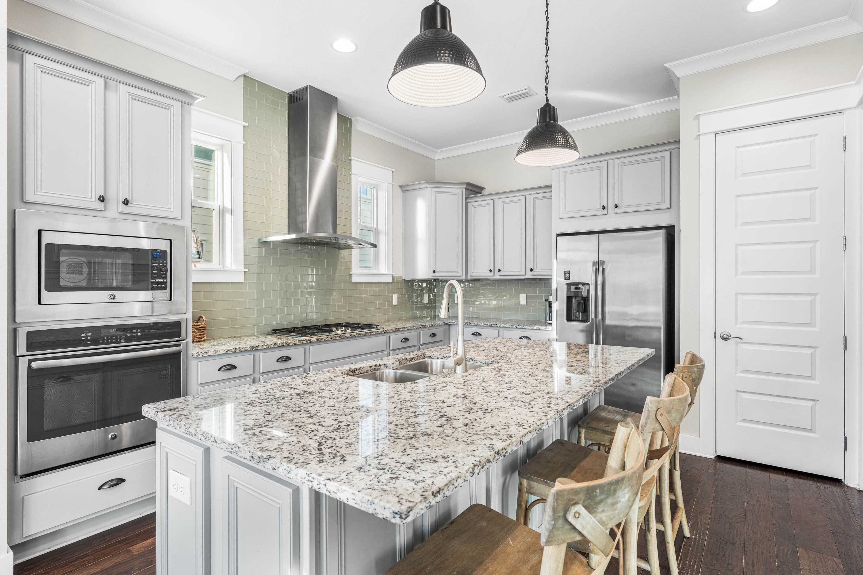 91 Milestone Dr Inlet Beach, Unit B Inlet Beach, FL 32461 - Photo 5 of 51 a kitchen with stainless steel appliances granite countertop a sink stove and refrigerator