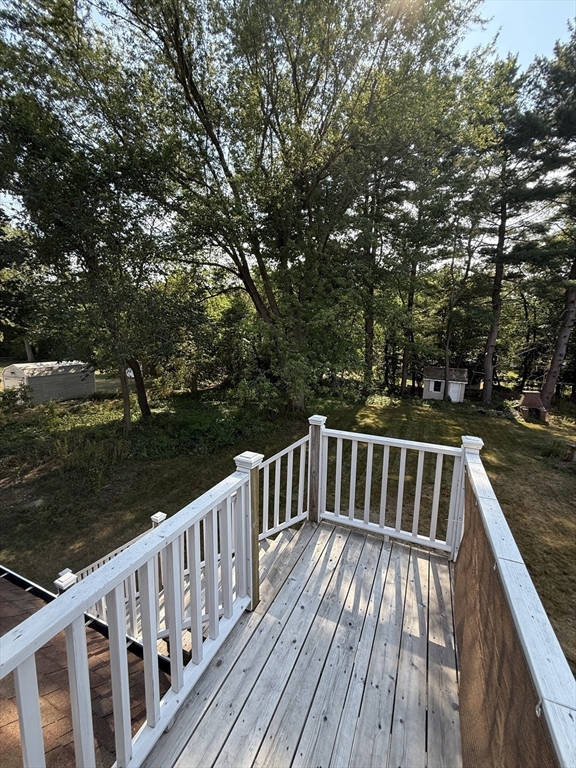 20 Alma Road Burlington, MA 01803 - Photo 23 of 26 a view of balcony with wooden floor and lake