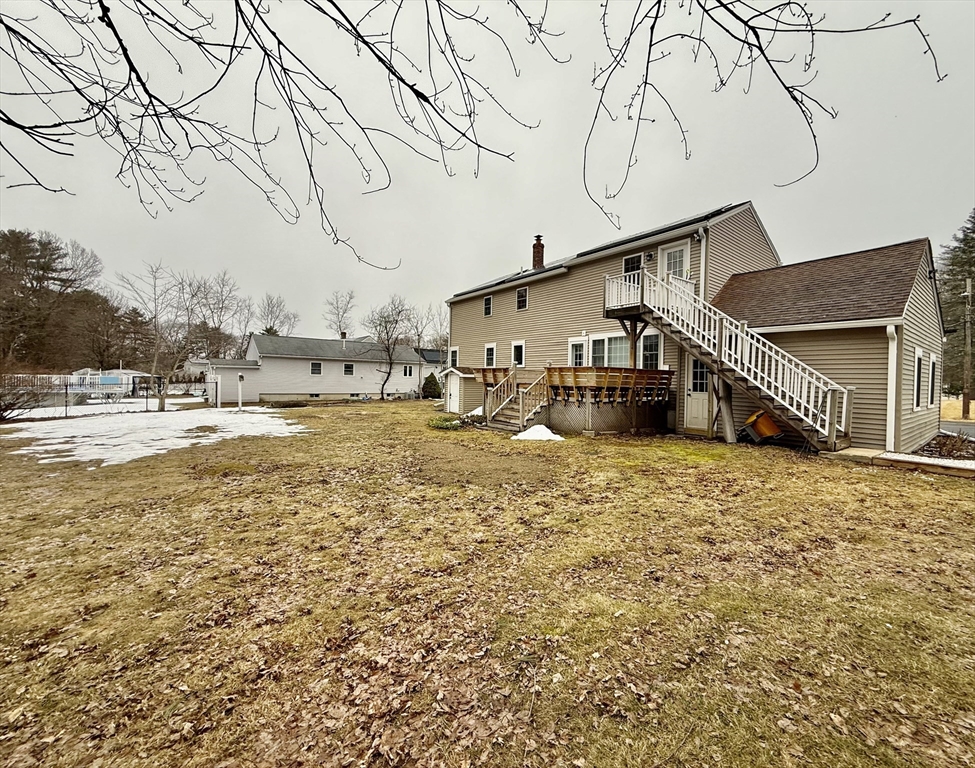 20 Alma Road Burlington, MA 01803 - Photo 26 of 26 a large white house with a large tree in front of it
