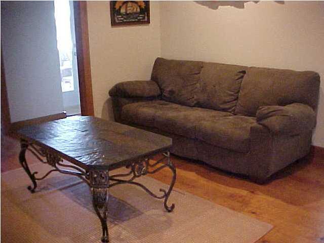 299 Defuniak Street Santa Rosa Beach, FL 32459 - Photo 14 of 16 a living room with furniture and a wooden floor