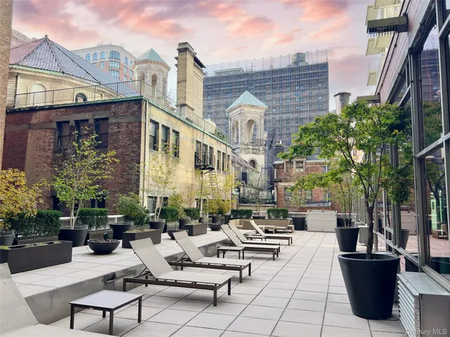 a building outdoor space with patio furniture
