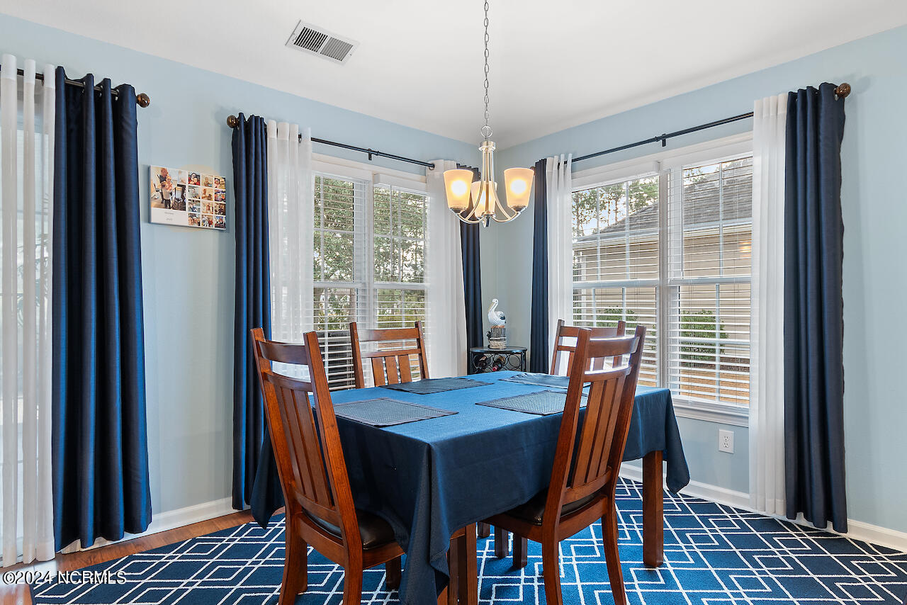 505 Planter's Ridge Drive Sunset Beach, NC 28468 - Photo 14 of 47 off kitchen, tons of natural light, updated lighting fixtures
