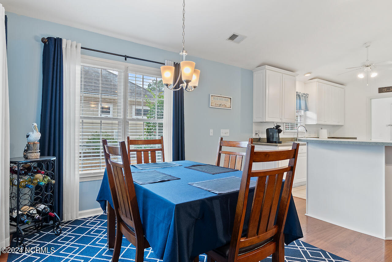 505 Planter's Ridge Drive Sunset Beach, NC 28468 - Photo 15 of 47 Open into the kitchen so the cook doesn't miss anything!