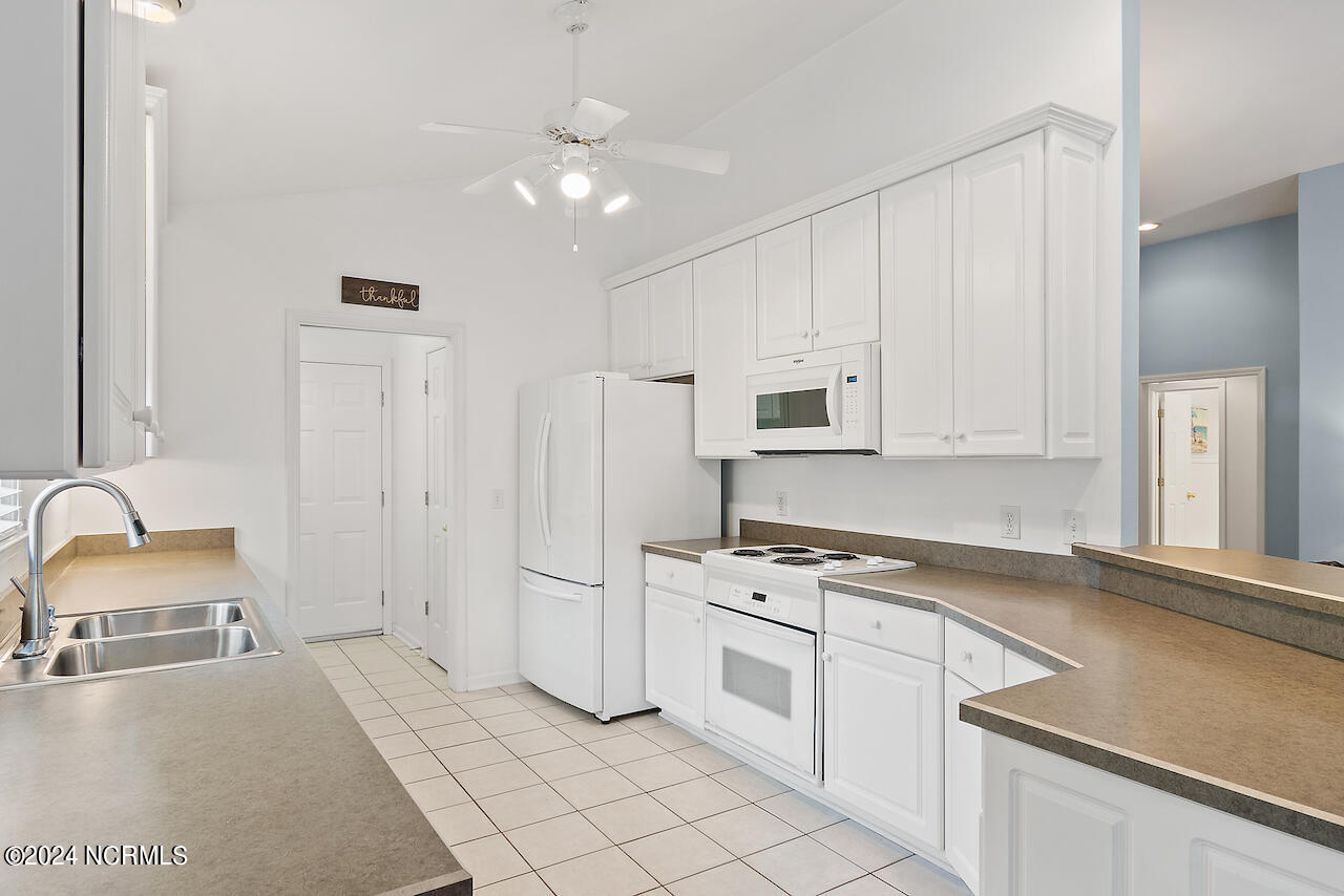 505 Planter's Ridge Drive Sunset Beach, NC 28468 - Photo 19 of 47 also has a pantry