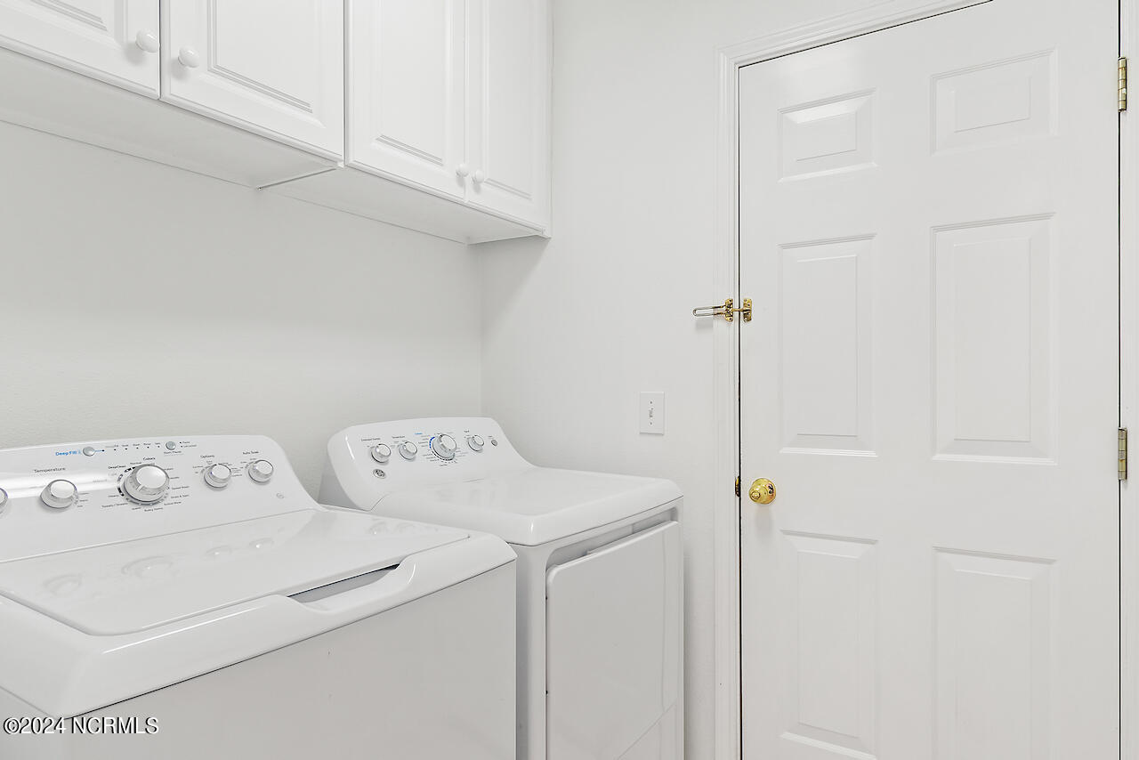 505 Planter's Ridge Drive Sunset Beach, NC 28468 - Photo 21 of 47 off Kitchen and garage. Perfect entry into the home