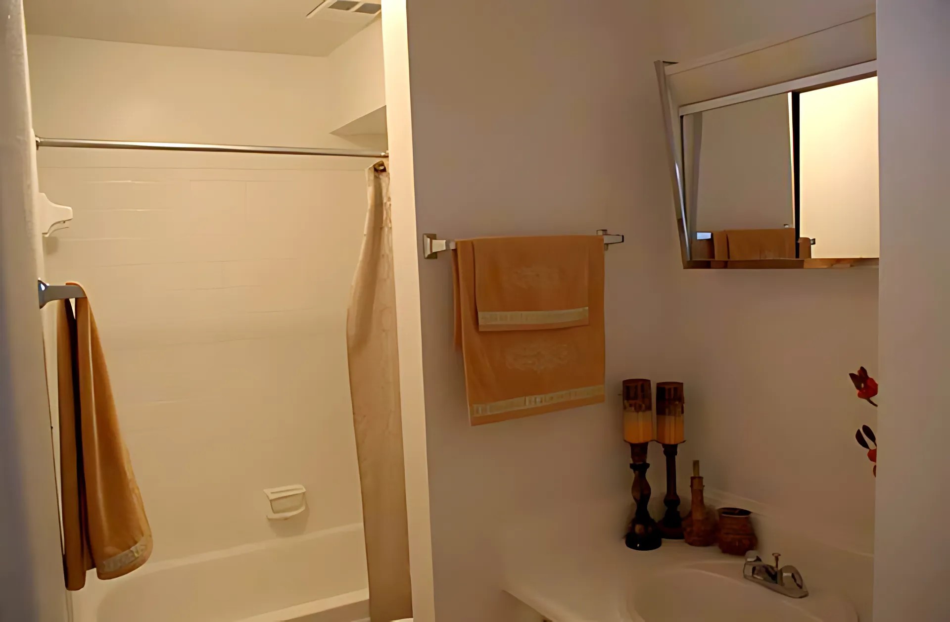 6311 Beverly Hill Street, Unit 121 Houston, TX 77057 - Photo 6 of 7 a bathroom with a shower and a sink