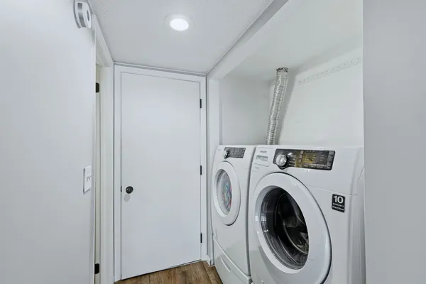 a utility room with dryer and washer