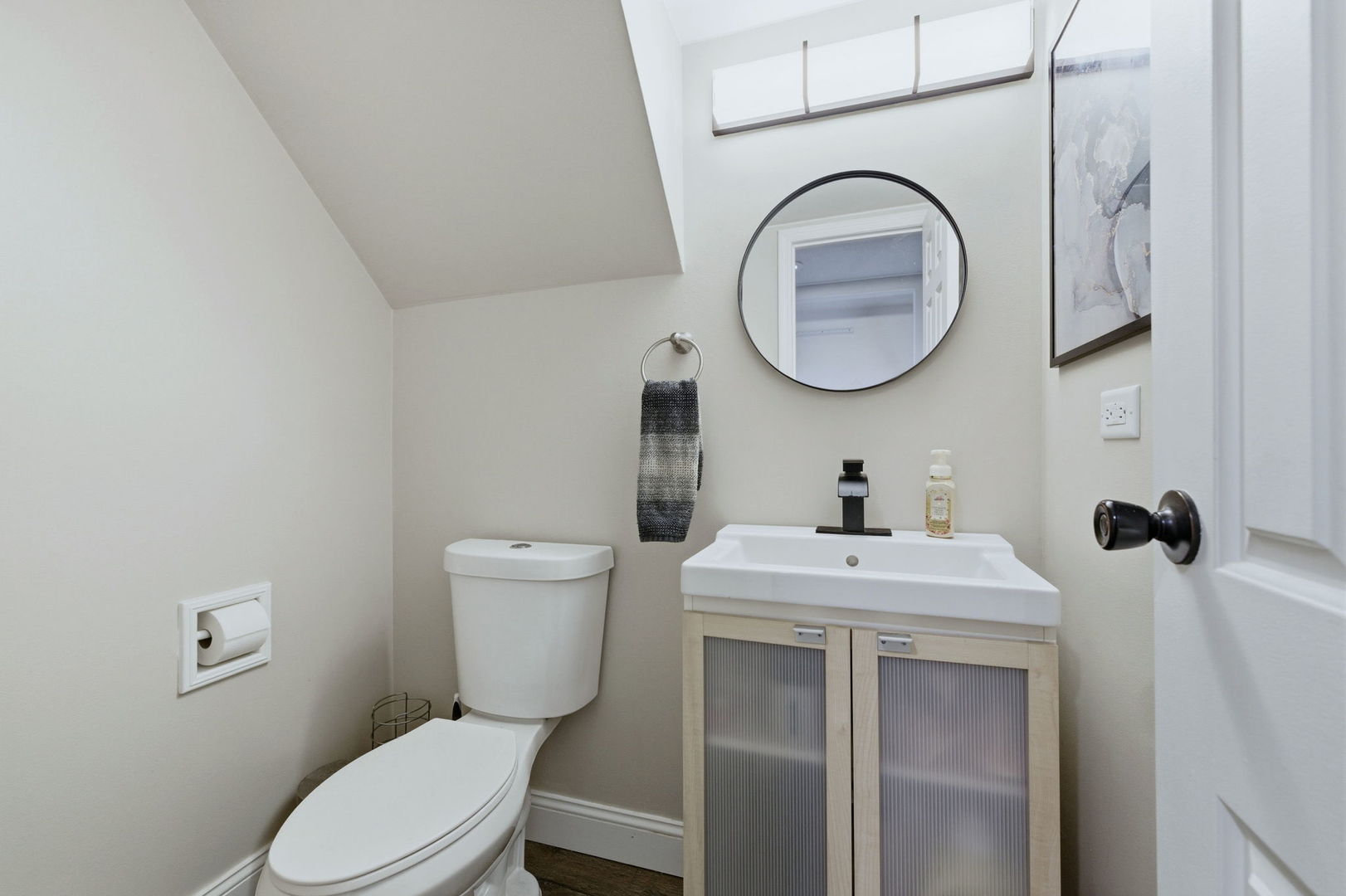 345 Redwing Drive Bolingbrook, IL 60440 - Photo 8 of 16 a bathroom with a toilet a sink and mirror