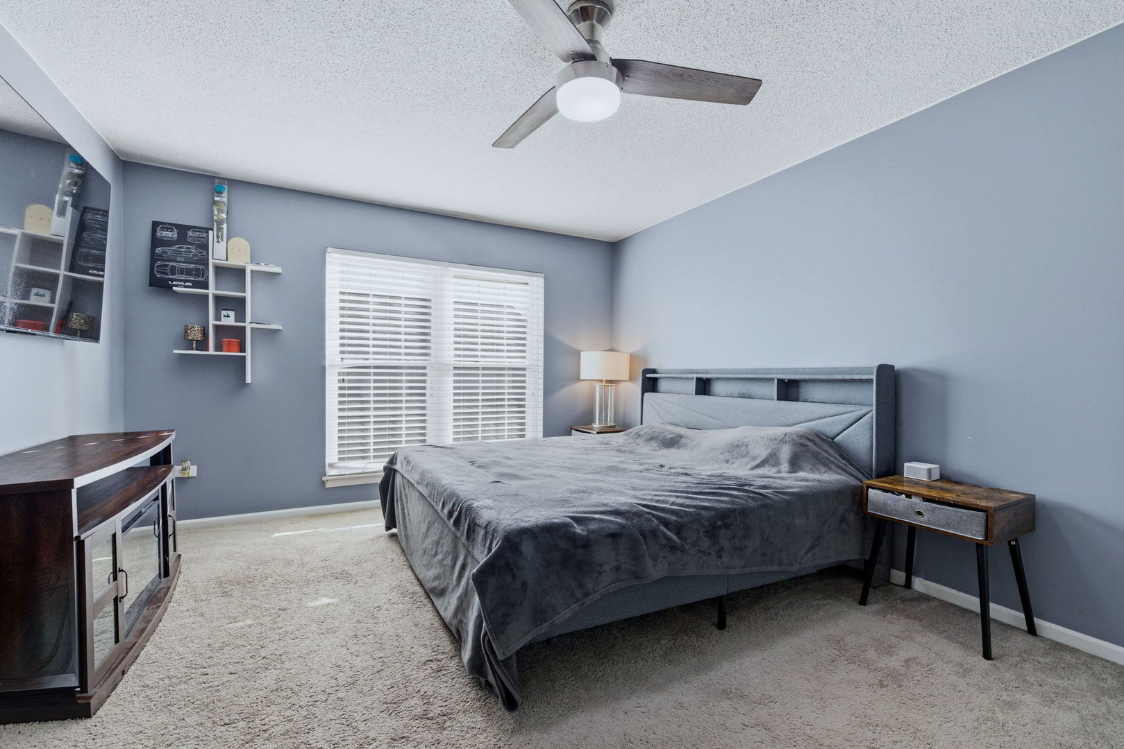 345 Redwing Drive Bolingbrook, IL 60440 - Photo 9 of 16 a spacious bedroom with a bed and a window