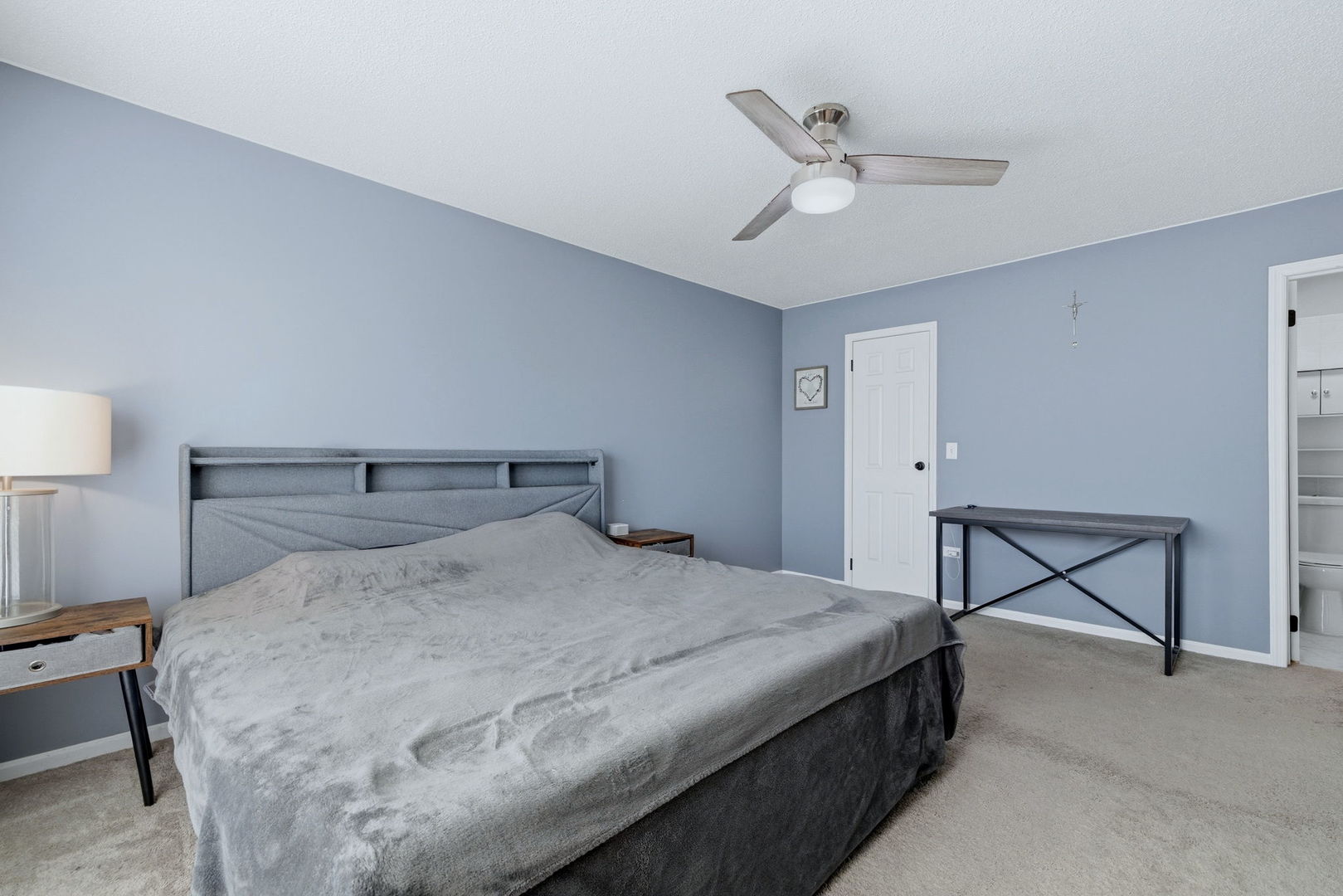 345 Redwing Drive Bolingbrook, IL 60440 - Photo 10 of 16 a bedroom with a bed a desk and chair