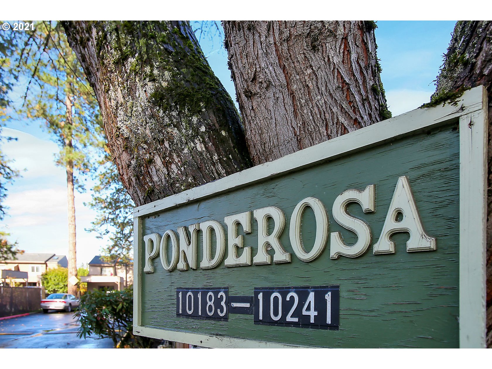 10237 Southwest Denney Road Beaverton, OR 97008 - Photo 2 of 32 a street sign that is on a pole