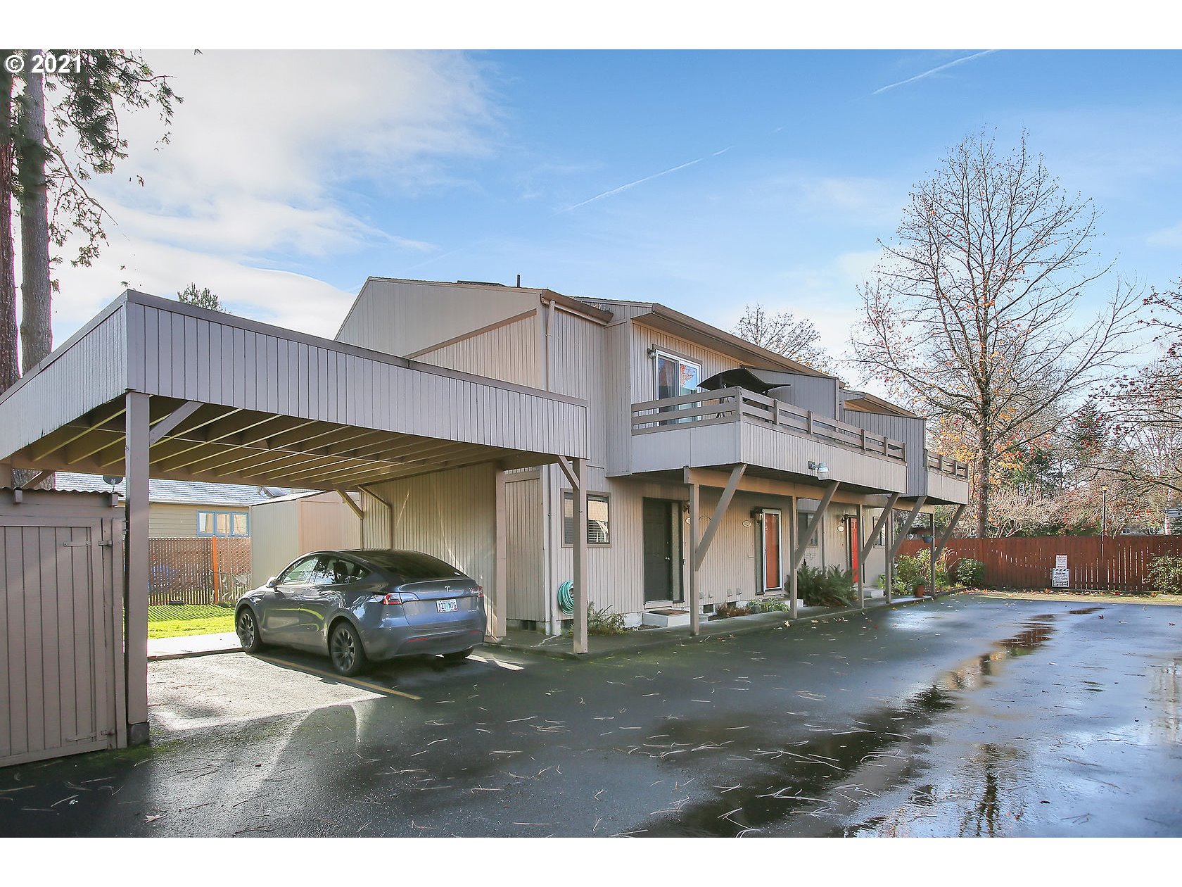 10237 Southwest Denney Road Beaverton, OR 97008 - Photo 3 of 32 a view of a car park in front of house
