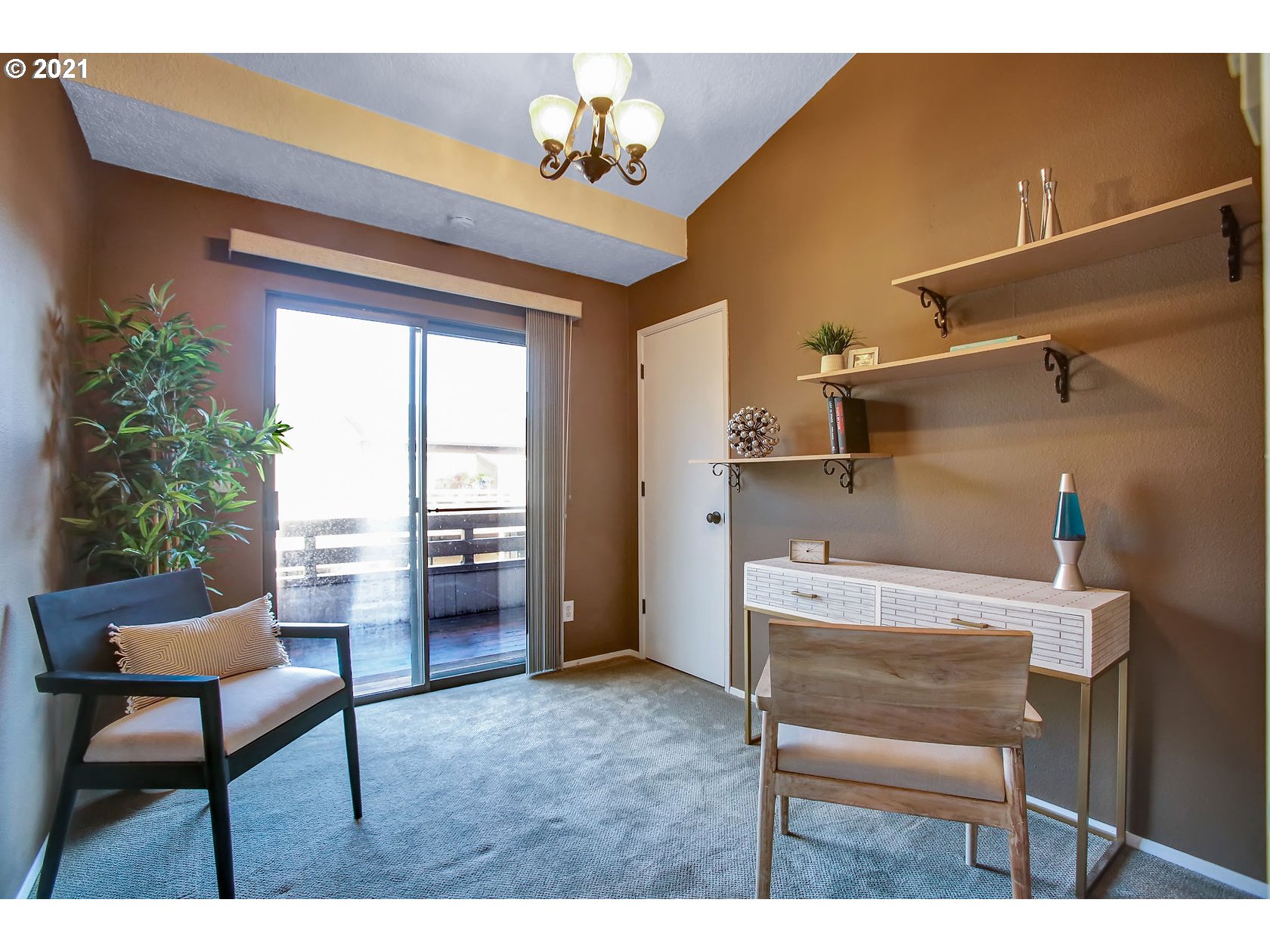 10237 Southwest Denney Road Beaverton, OR 97008 - Photo 24 of 32 a view of a livingroom with furniture and a window