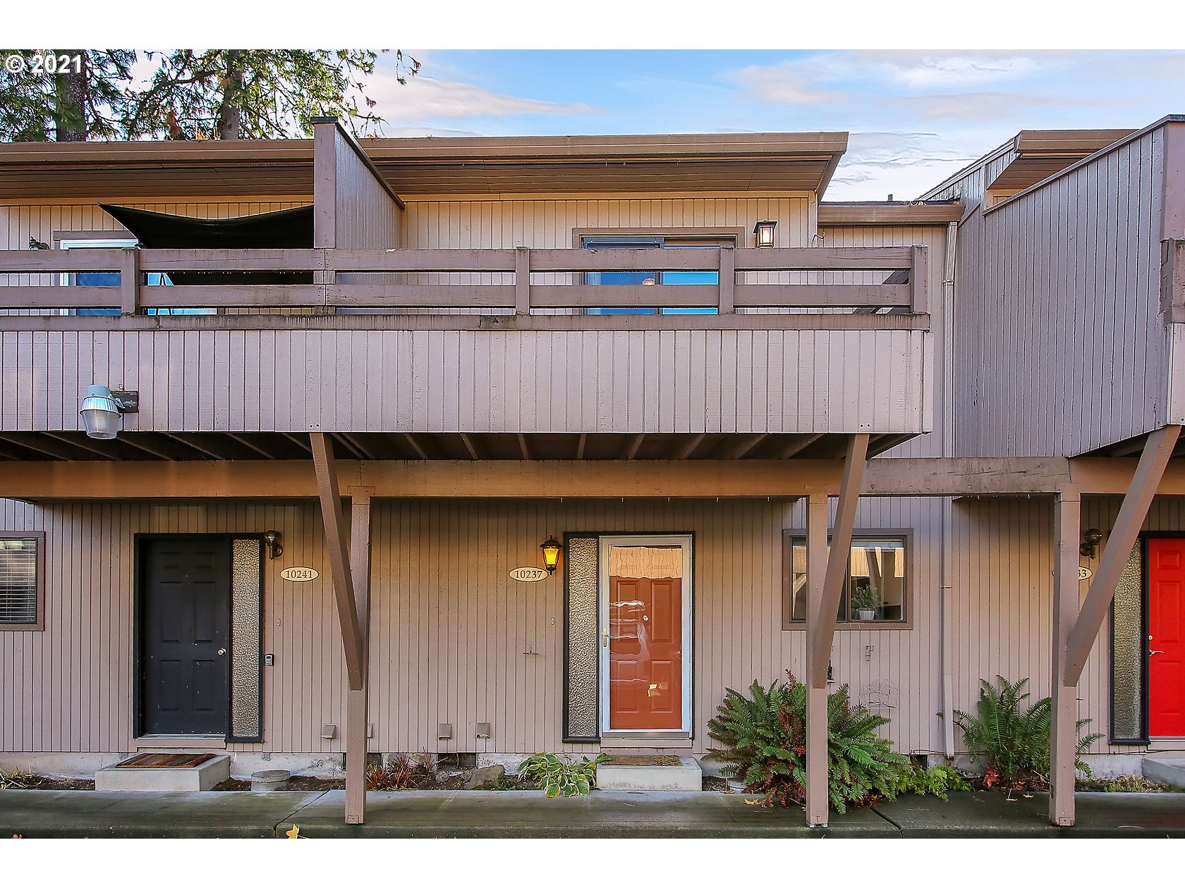 10237 Southwest Denney Road Beaverton, OR 97008 - Photo 5 of 32 a front view of a house with balcony and outdoor space