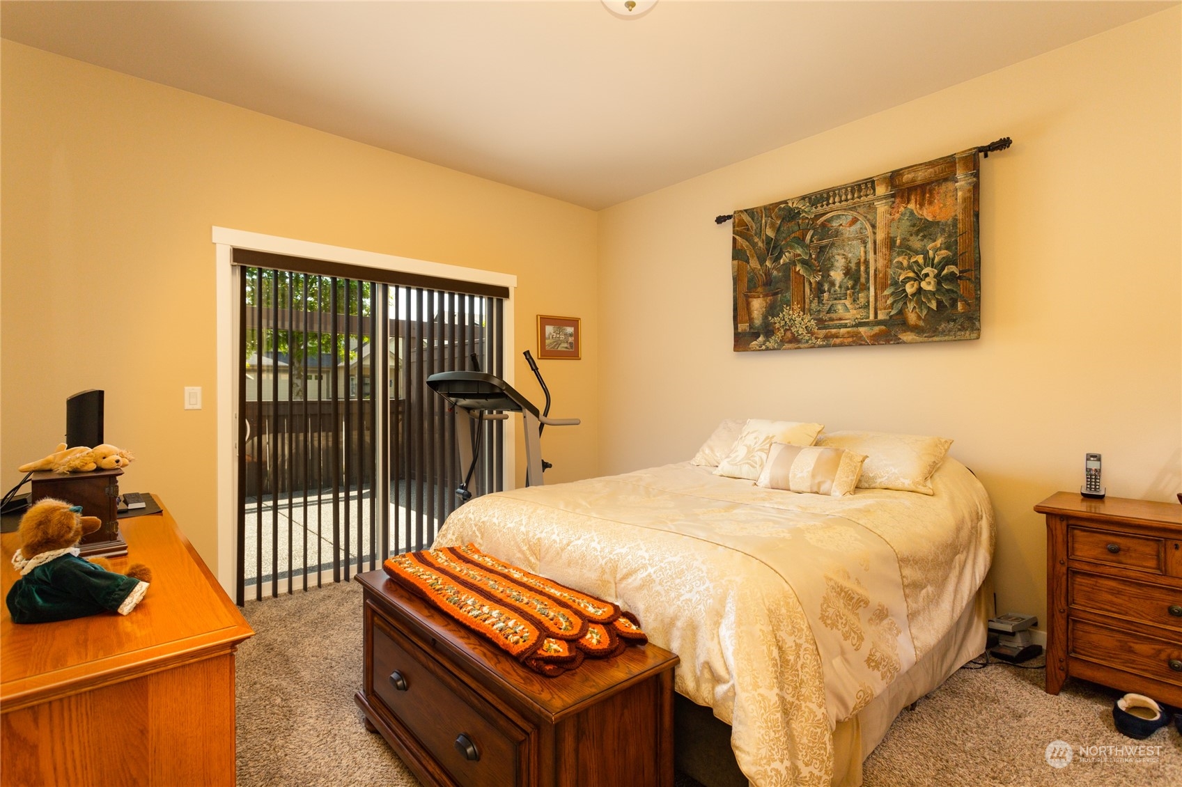 1563 Bryce Park Loop Lynden, WA 98264 - Photo 17 of 32 a bedroom with a bed and wooden floor