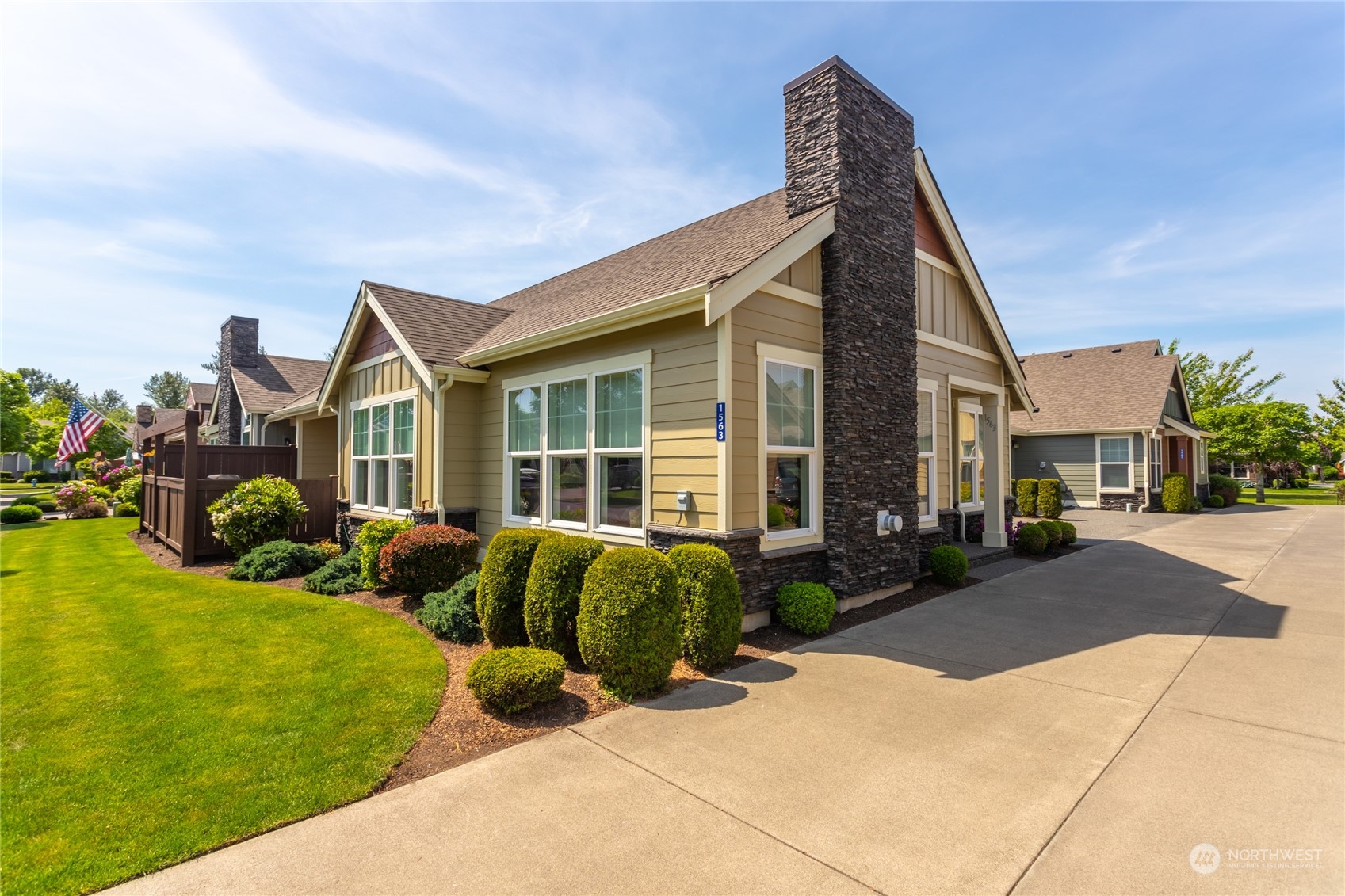 1563 Bryce Park Loop Lynden, WA 98264 - Photo 2 of 32 a front view of a house with garden