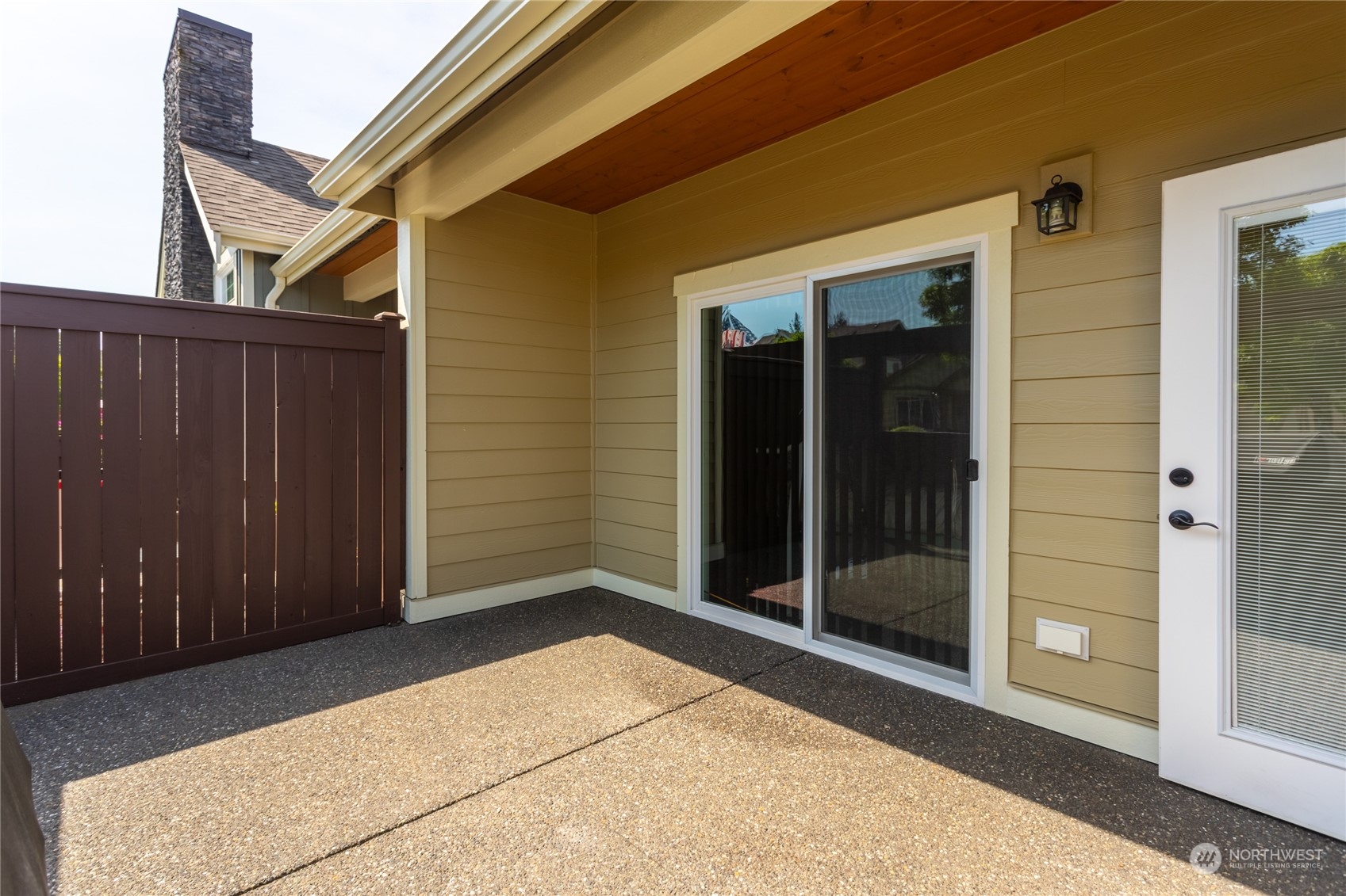 1563 Bryce Park Loop Lynden, WA 98264 - Photo 21 of 32 a view of backyard with door and wooden floor