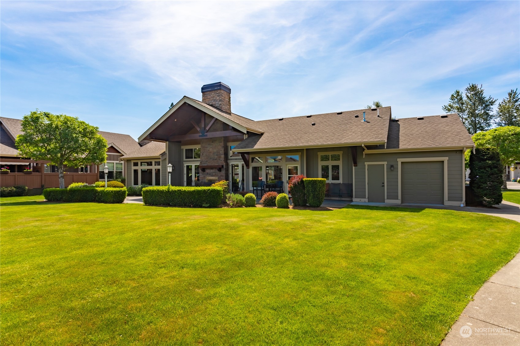 1563 Bryce Park Loop Lynden, WA 98264 - Photo 23 of 32 a front view of a house with a garden