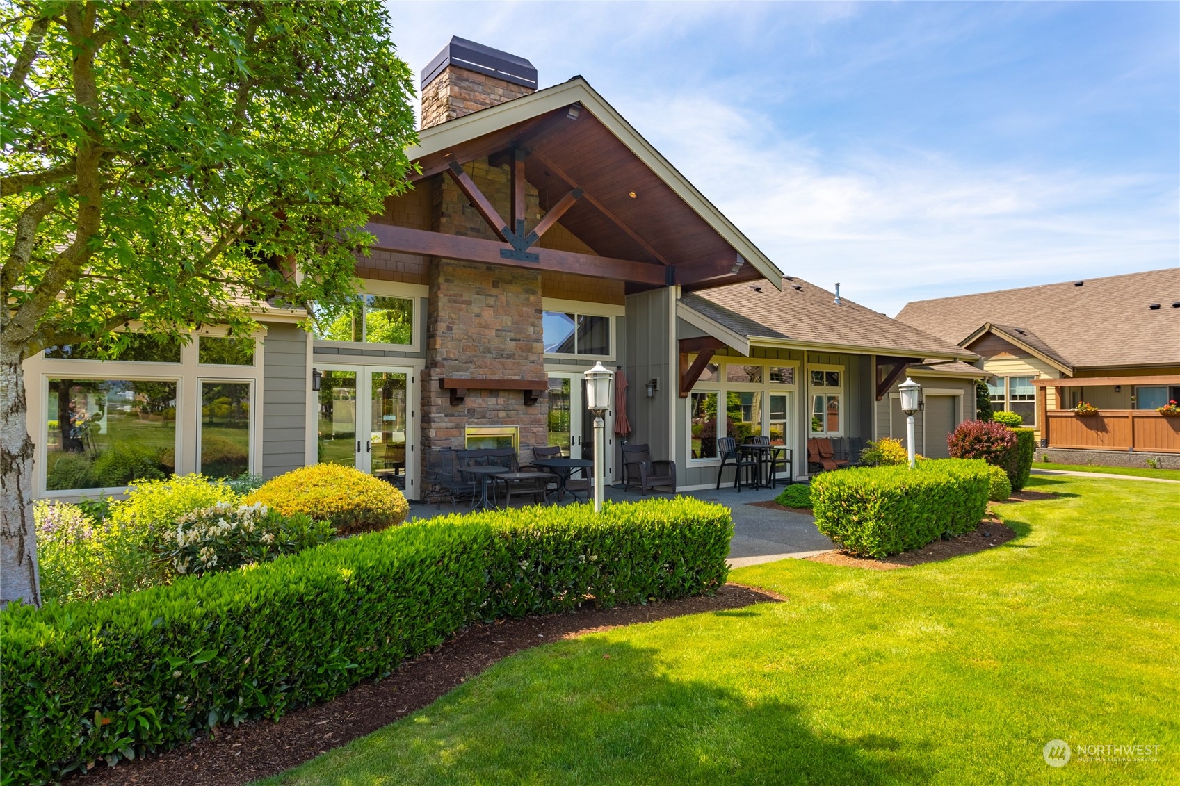 1563 Bryce Park Loop Lynden, WA 98264 - Photo 24 of 32 a view of a house with a big yard and potted plants