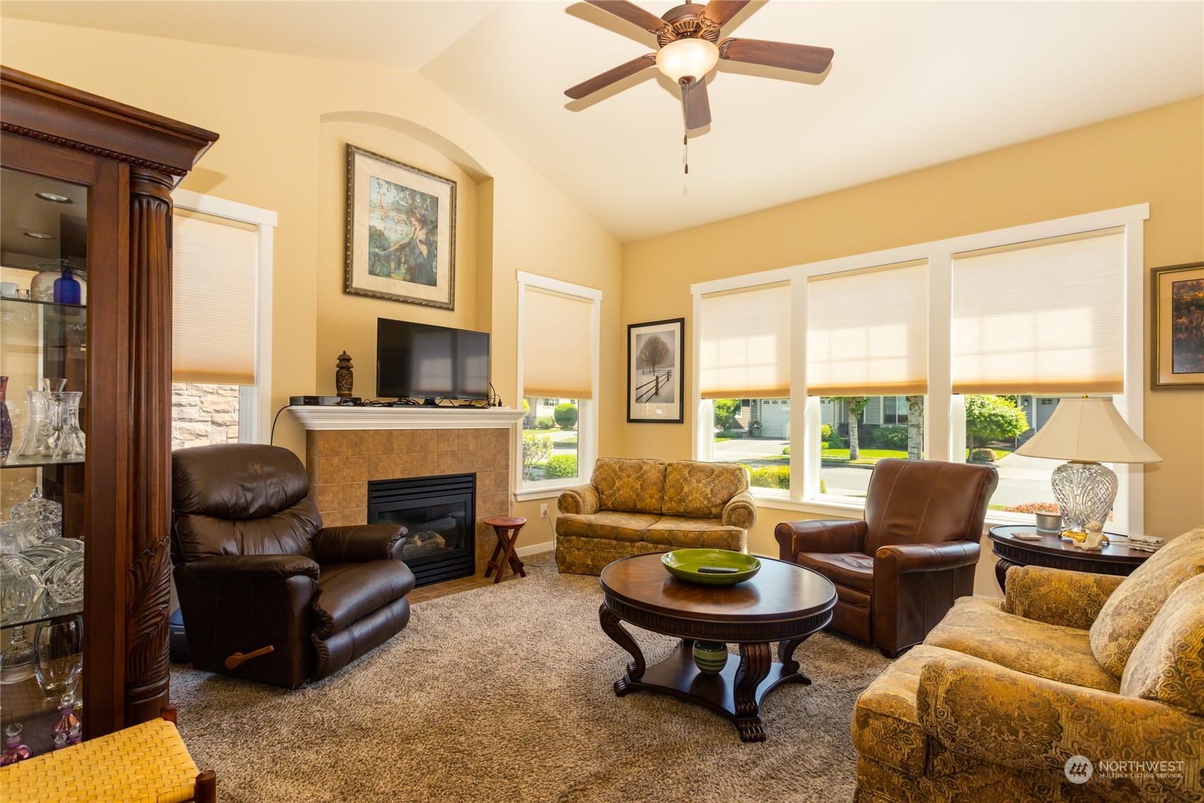 1563 Bryce Park Loop Lynden, WA 98264 - Photo 6 of 32 a living room with furniture fireplace and a large window