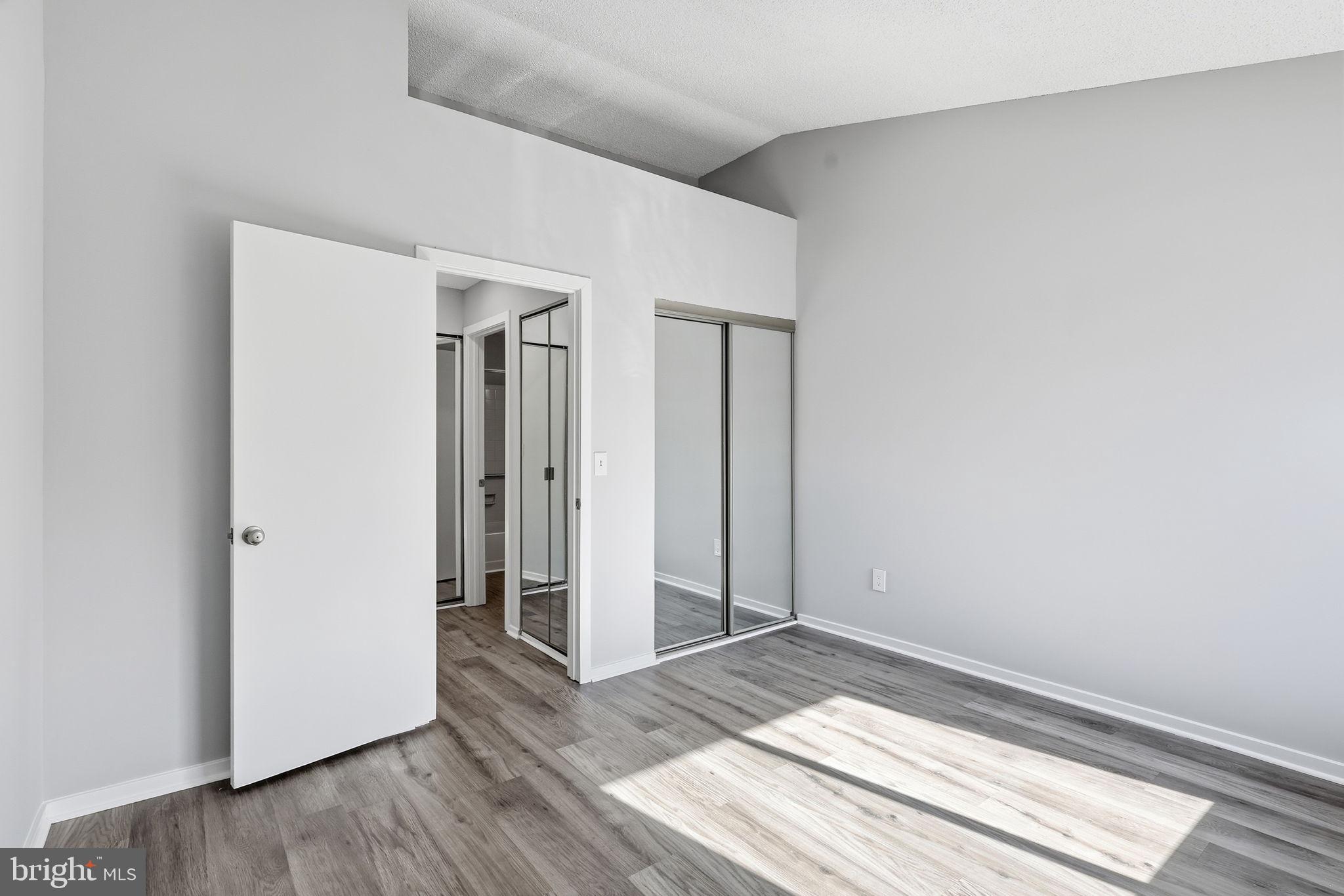 1508 Summerchase Court Reston, VA 20194 - Photo 16 of 23 a view of hallway with wooden floor