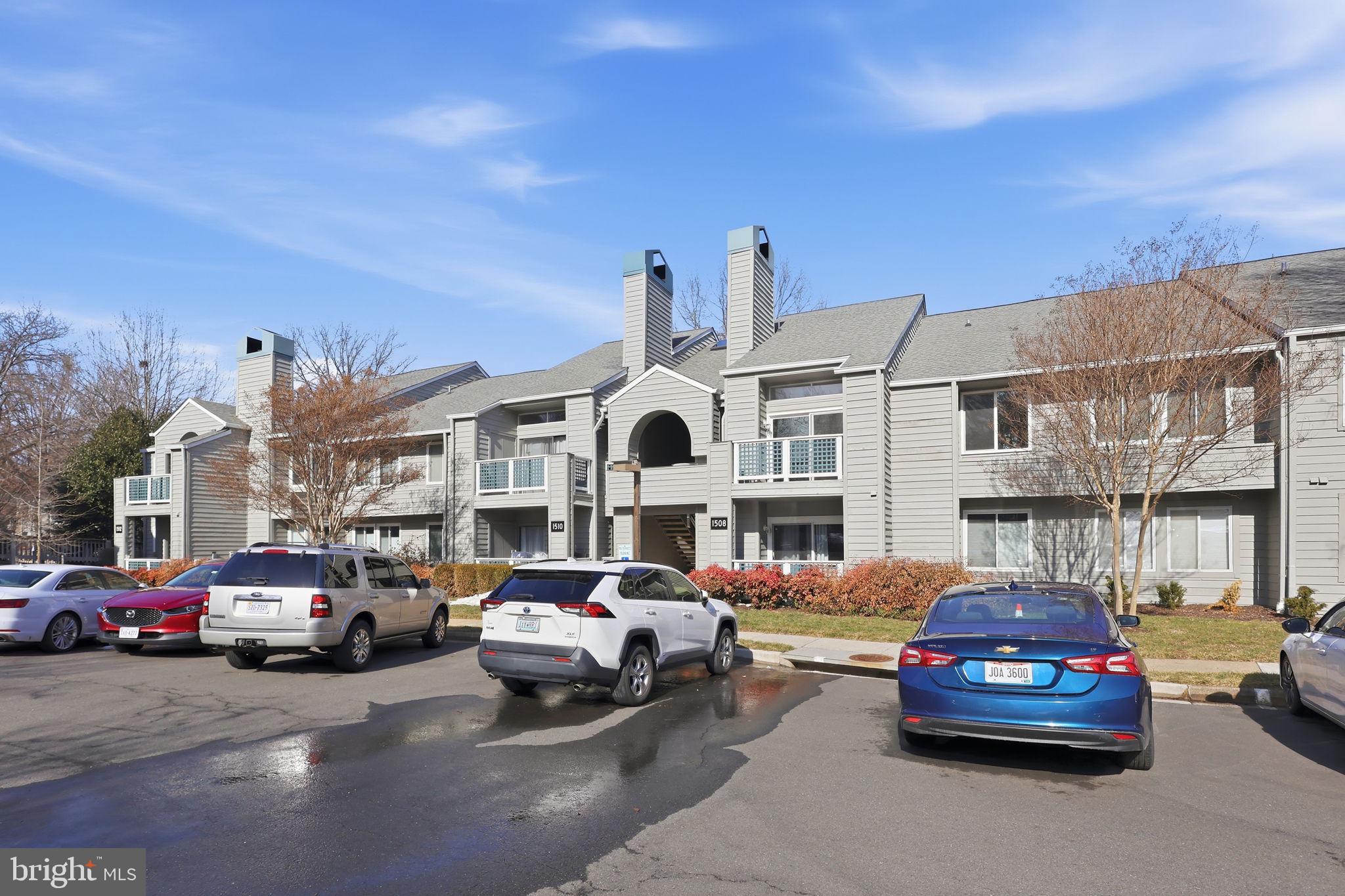 1508 Summerchase Court Reston, VA 20194 - Photo 3 of 23 a car parked in front of a building