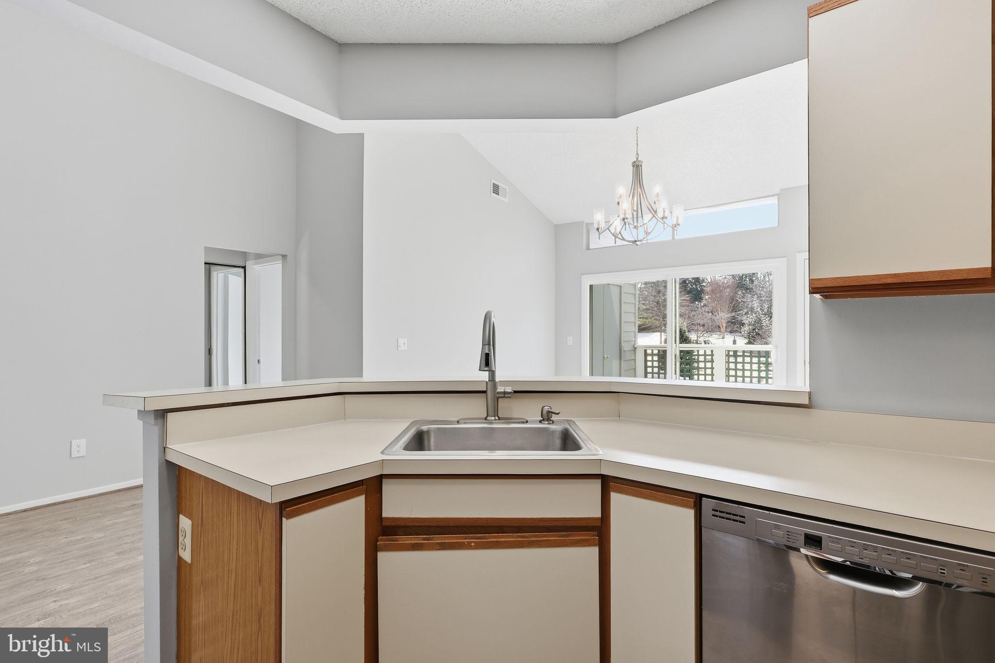 1508 Summerchase Court Reston, VA 20194 - Photo 9 of 23 a view of a sink cabinets and window