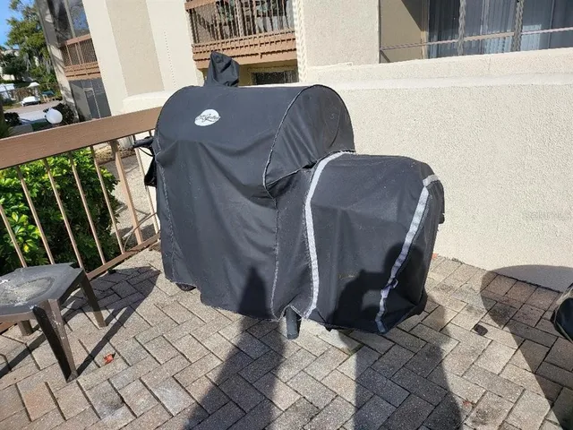 a view of balcony with furniture