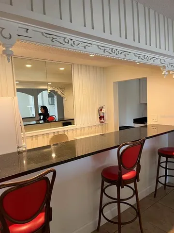 a view of a living room and dining room