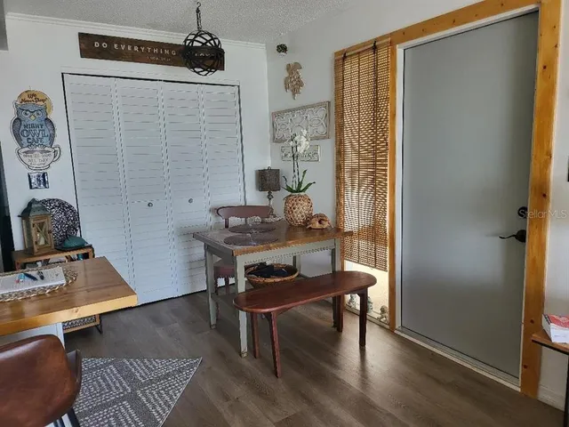 a room with furniture and a wooden floor