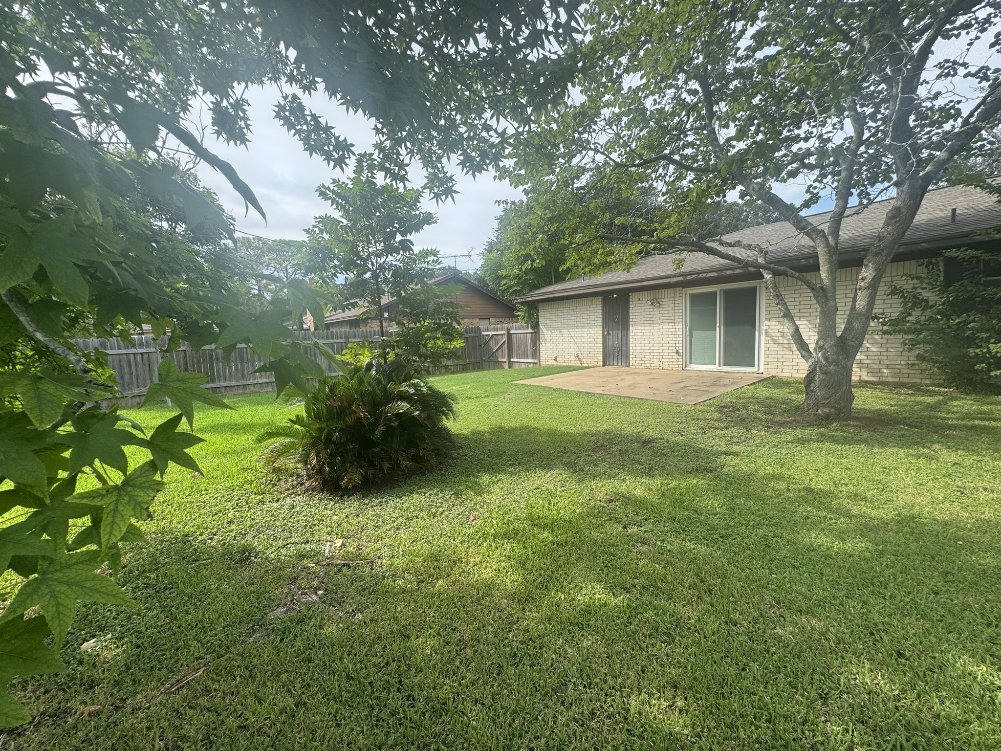 706 University Avenue Wharton, TX 77488 - Photo 27 of 29 a view of a house with a garden
