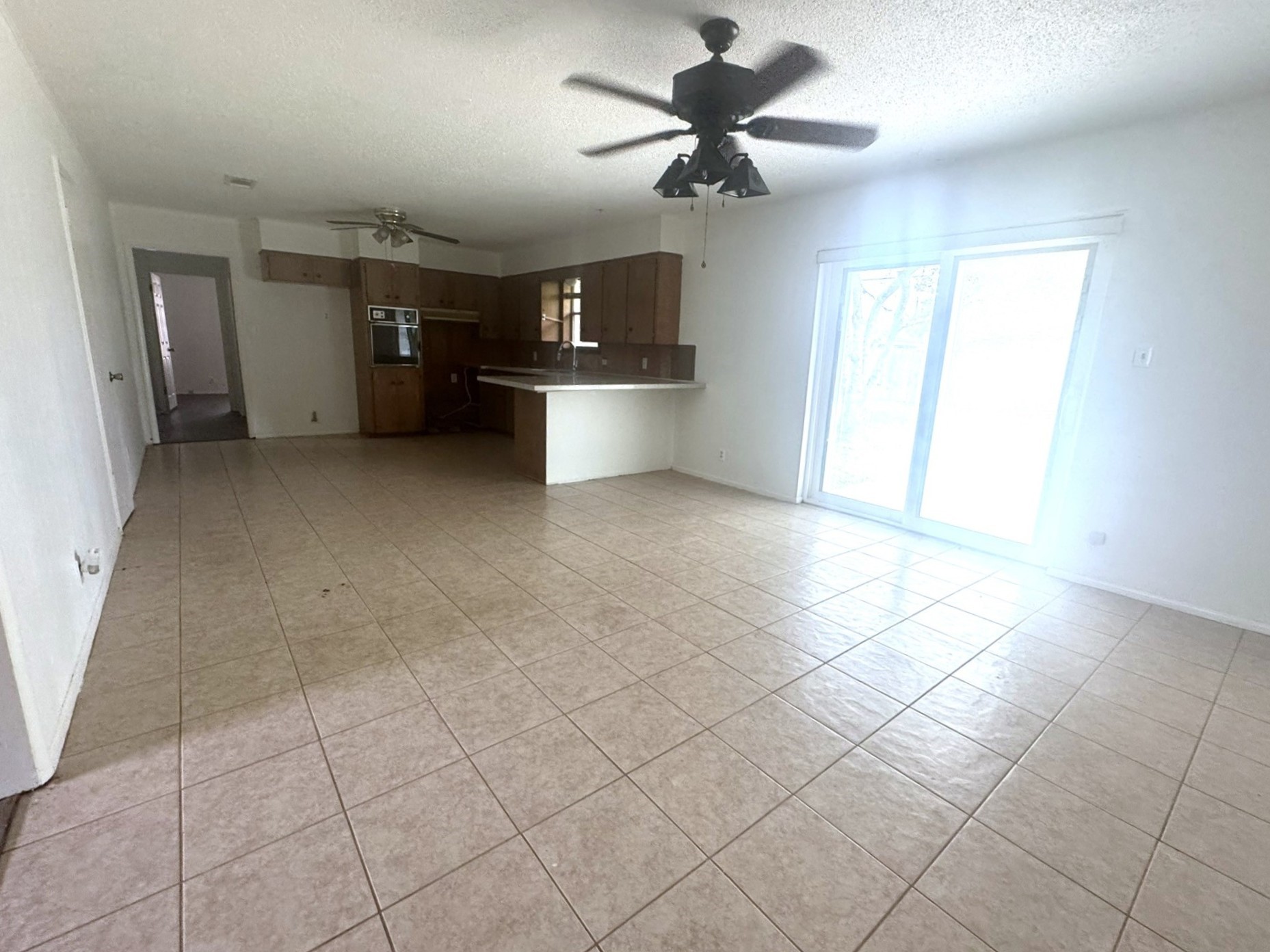 706 University Avenue Wharton, TX 77488 - Photo 5 of 29 a view of a kitchen with a sink and a window