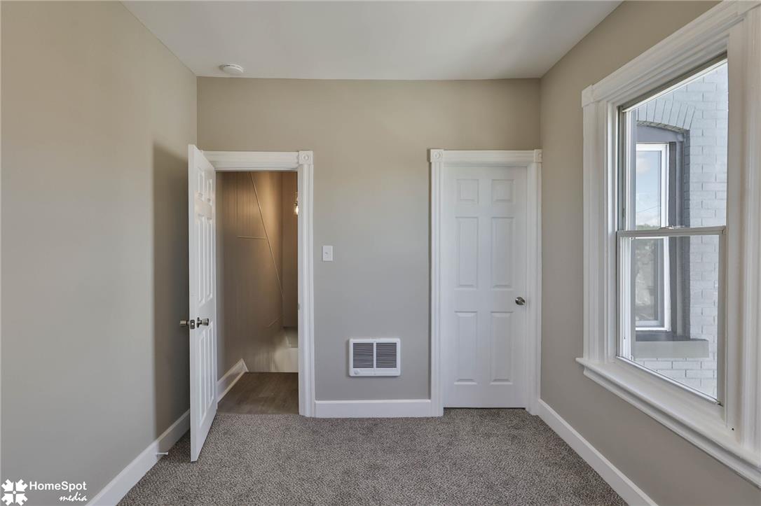 619 Sioux Street Bethlehem, PA 18015 - Photo 36 of 61 A well-maintained interior space showcasing light-colored walls and soft carpeting.