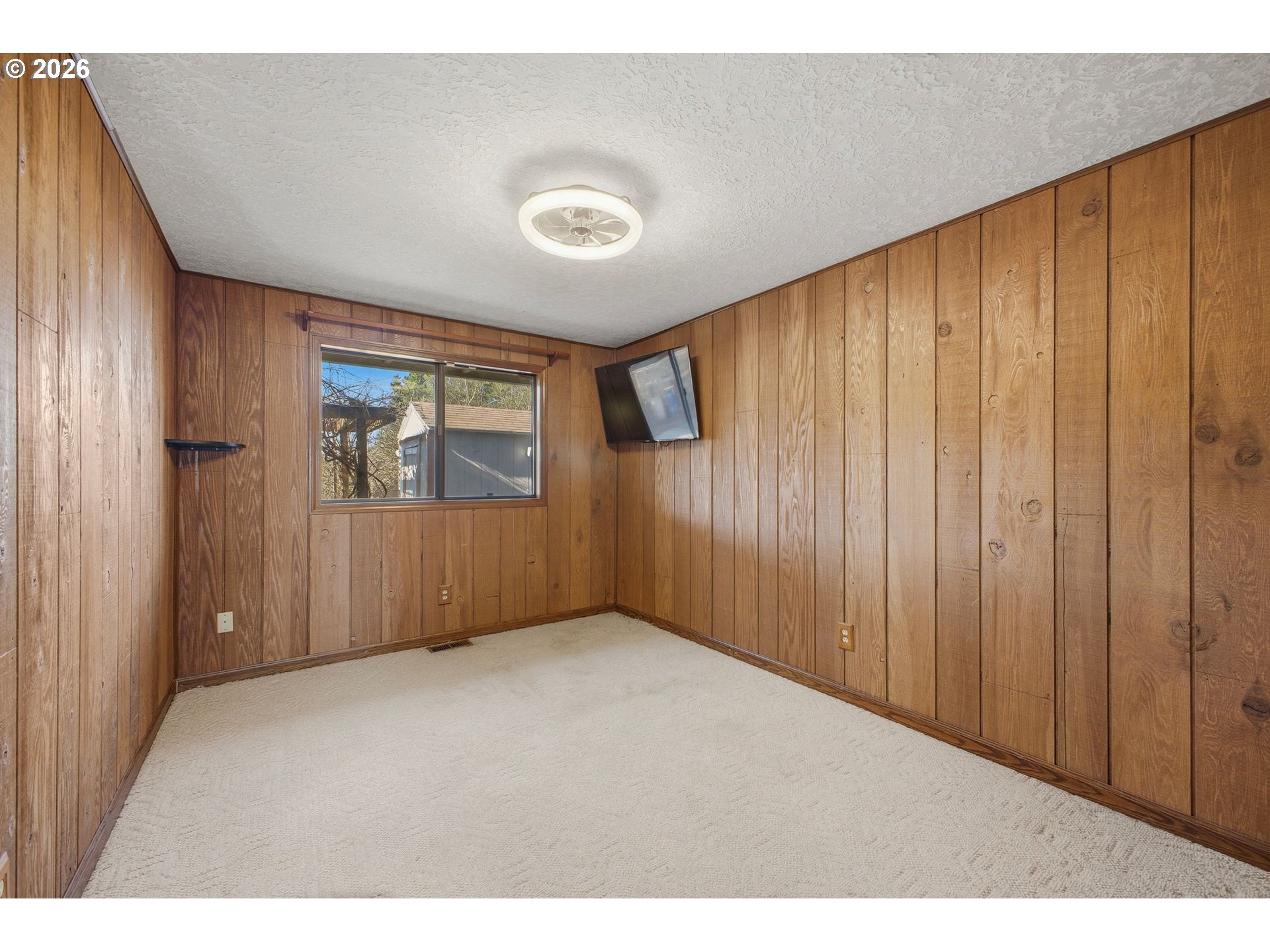 21858 Southwest Regal Court Beaverton, OR 97003 - Photo 16 of 29 a view of an empty room with a window