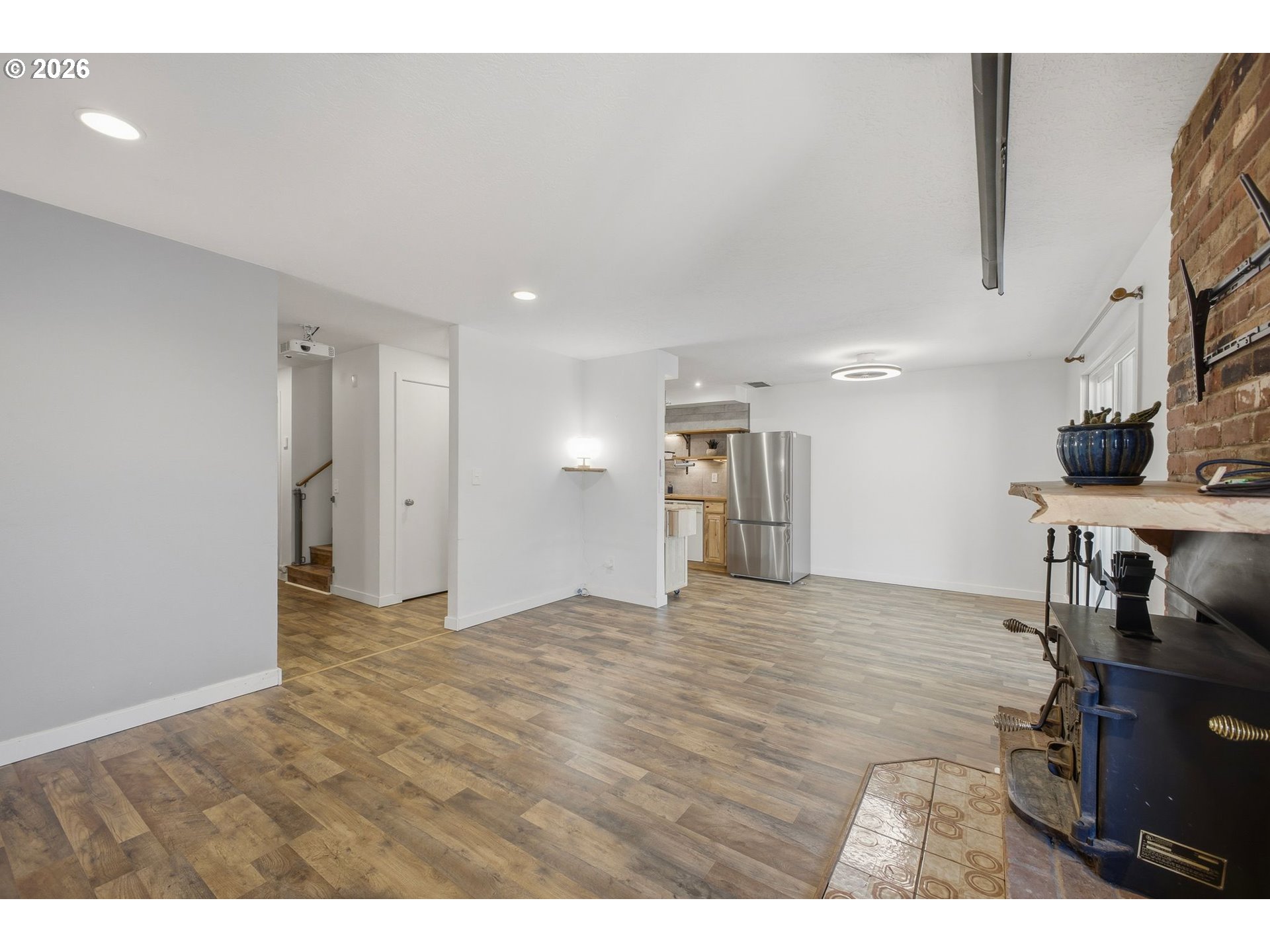 21858 Southwest Regal Court Beaverton, OR 97003 - Photo 6 of 29 a view of an empty room and kitchen