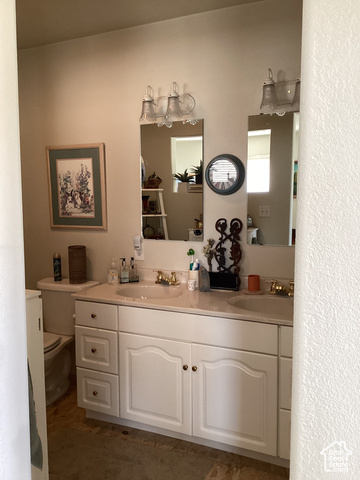 3 Red Circle, Unit 19 Manila, UT 84046 - Photo 12 of 29 Bathroom with double vanity and toilet