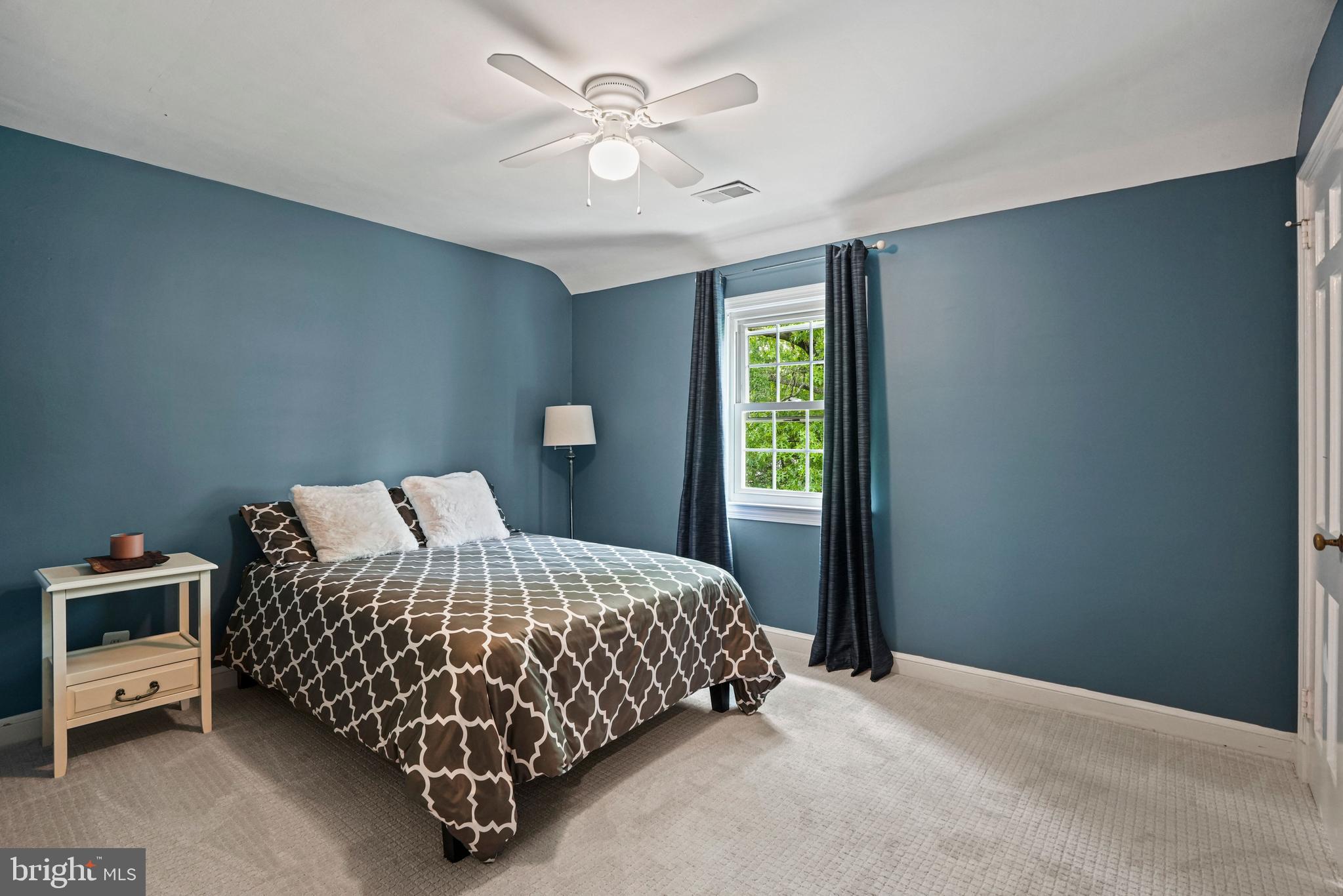 1907 Brisbane Street Silver Spring, MD 20902 - Photo 24 of 39 a bedroom with a bed and a ceiling fan