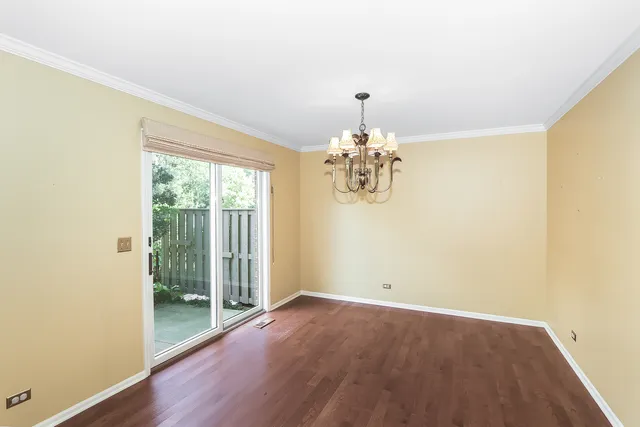 a view of a livingroom with wooden floor