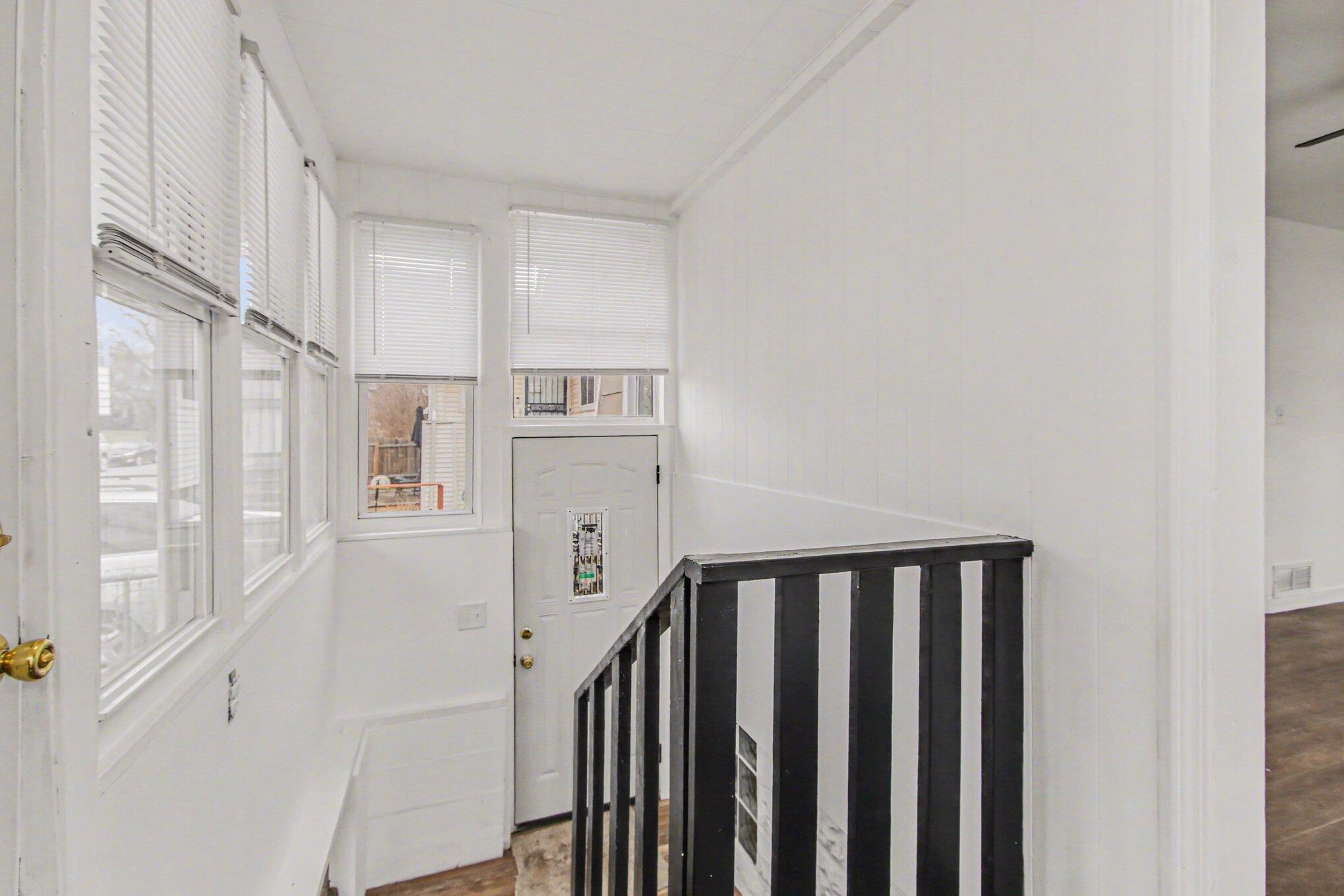 4471 Massachusetts Street Gary, IN 46409 - Photo 11 of 24 a view of a hallway with windows