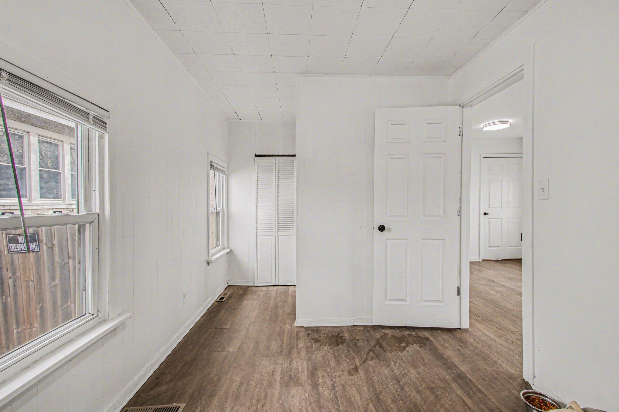 4471 Massachusetts Street Gary, IN 46409 - Photo 16 of 24 a view of a hallway with wooden floor