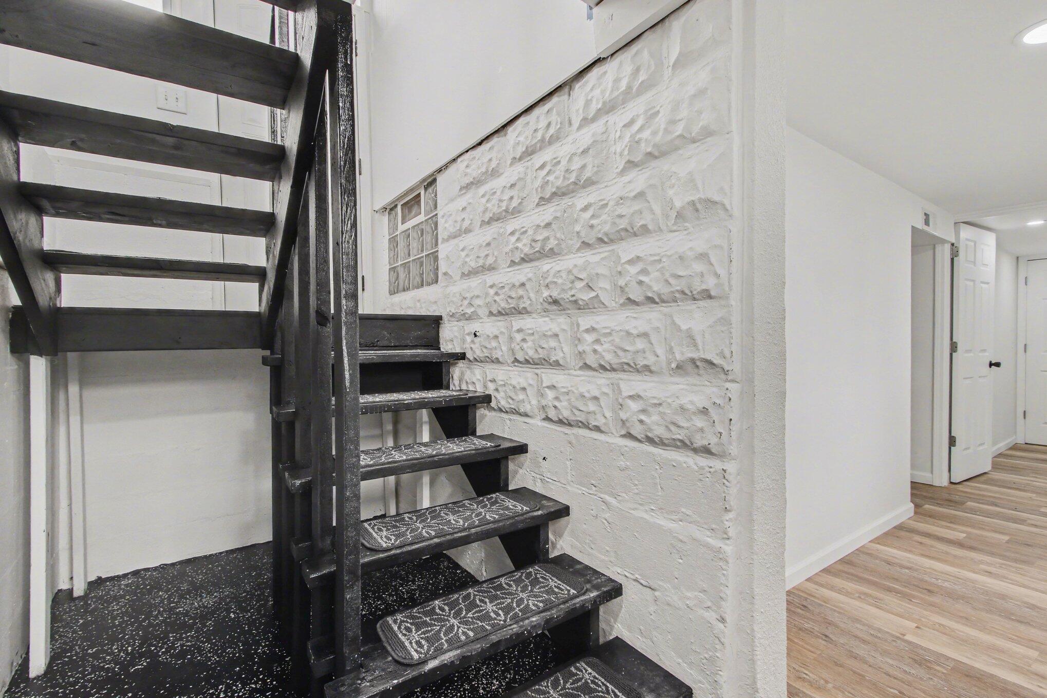 4471 Massachusetts Street Gary, IN 46409 - Photo 17 of 24 a view of staircase with wooden floor and seating space