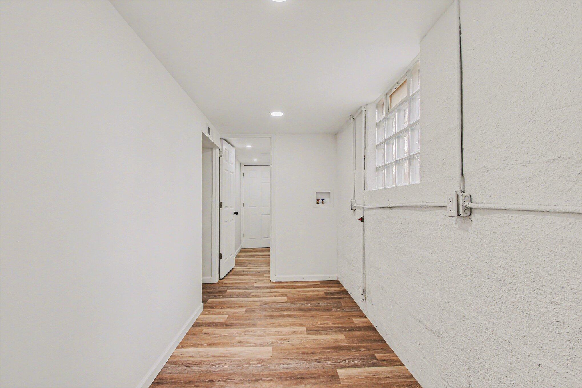 4471 Massachusetts Street Gary, IN 46409 - Photo 18 of 24 a view of a hallway with wooden floor and entryway
