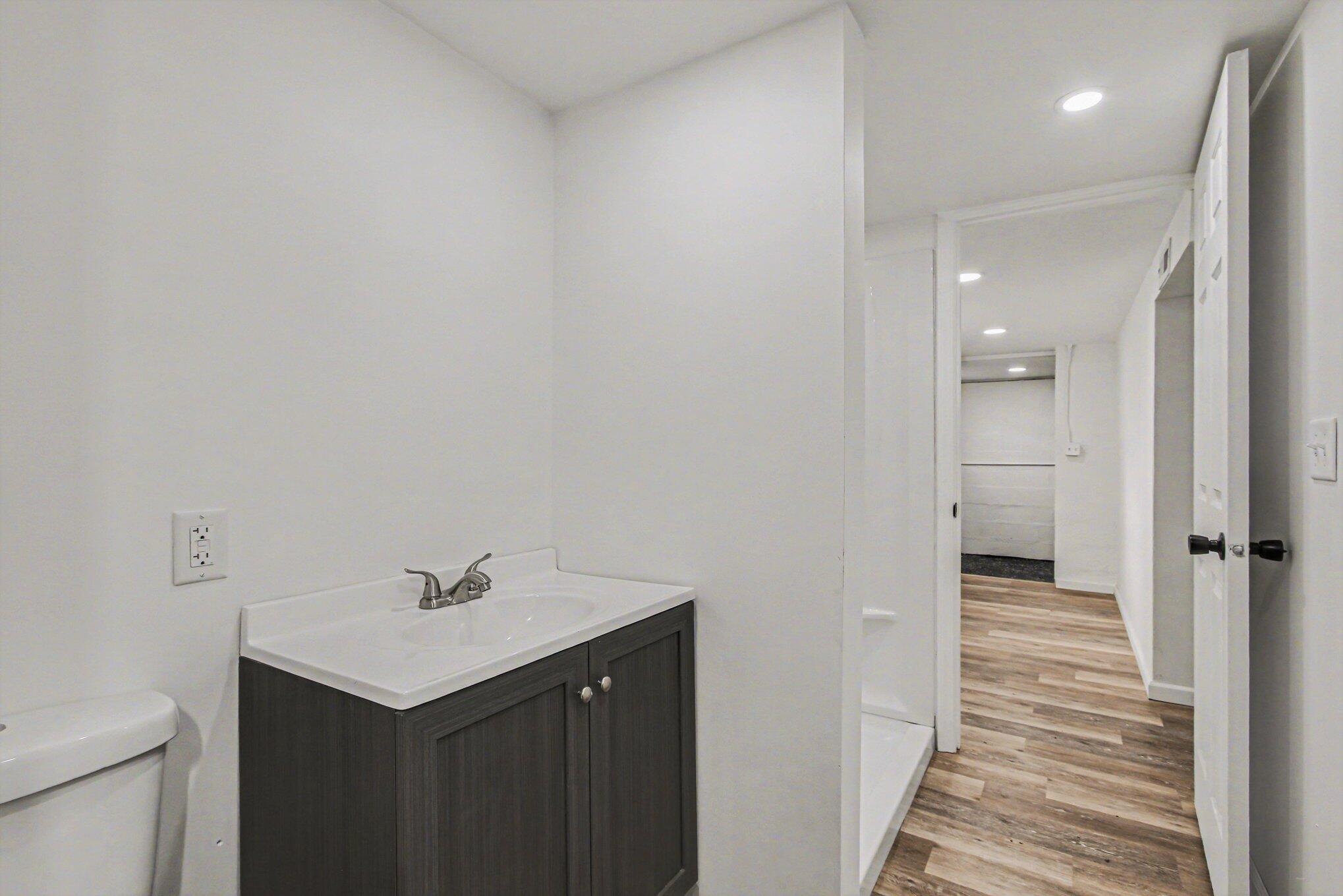 4471 Massachusetts Street Gary, IN 46409 - Photo 20 of 24 a bathroom with a sink and a mirror