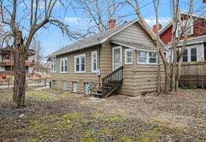 4471 Massachusetts Street Gary, IN 46409 - Photo 22 of 24 a front view of a house with a yard