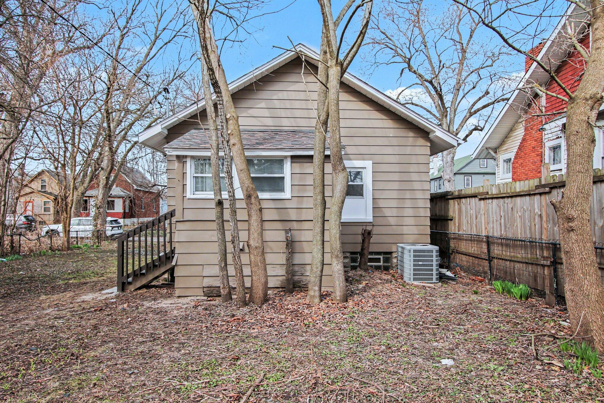 4471 Massachusetts Street Gary, IN 46409 - Photo 23 of 24 a view of a house with a yard